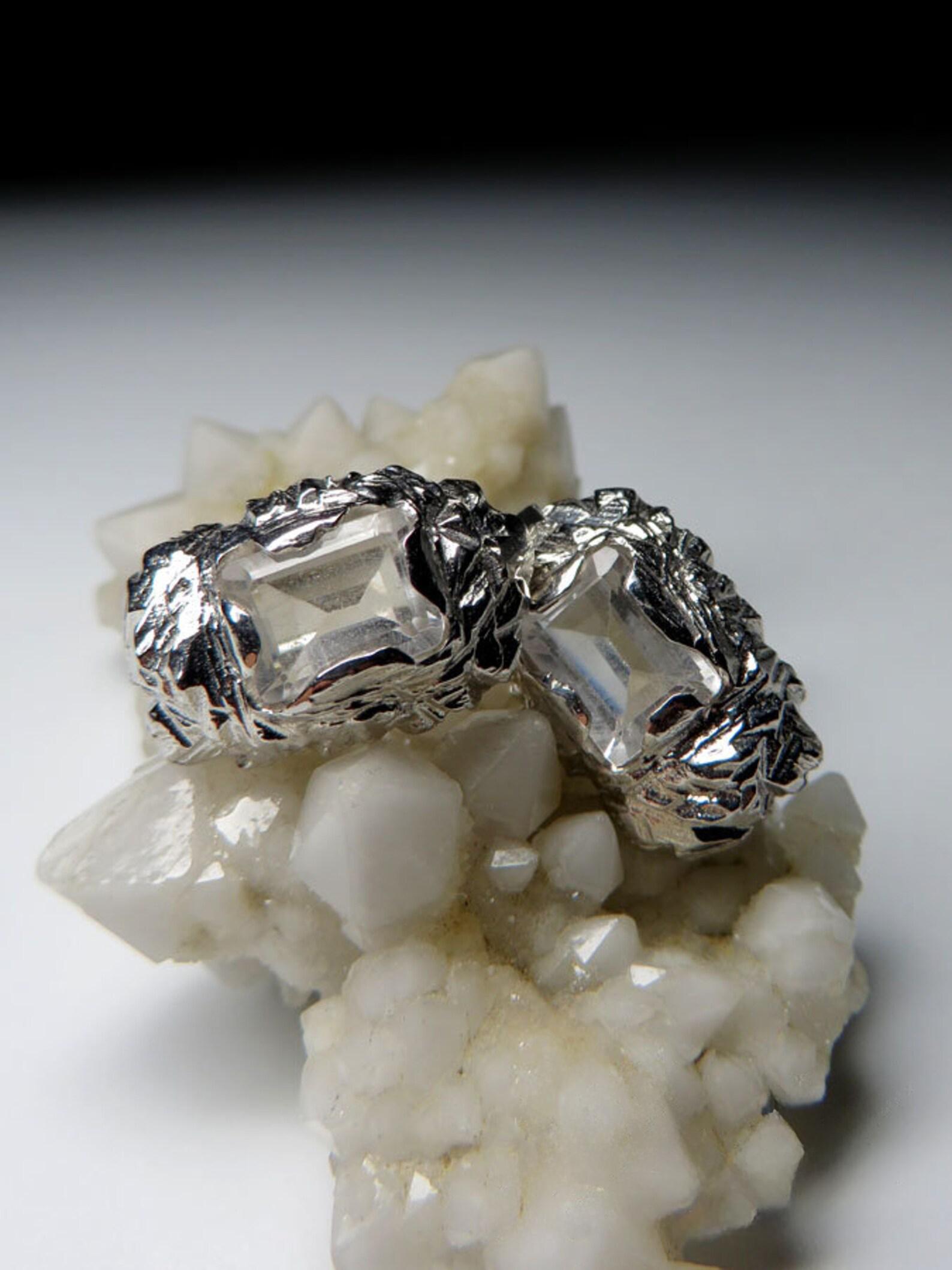 Silver earrings with natural Rock Crystal fantasy octagon cut
rock crystal origin - Brazil
stone measurements - 0.12 х 0.24 х 0.31 in / 3 х 6 х 8 mm
stone weight - 2.77 carats
earrings weight - 7.86 grams
earrings height - 0.59 in / 15 mm