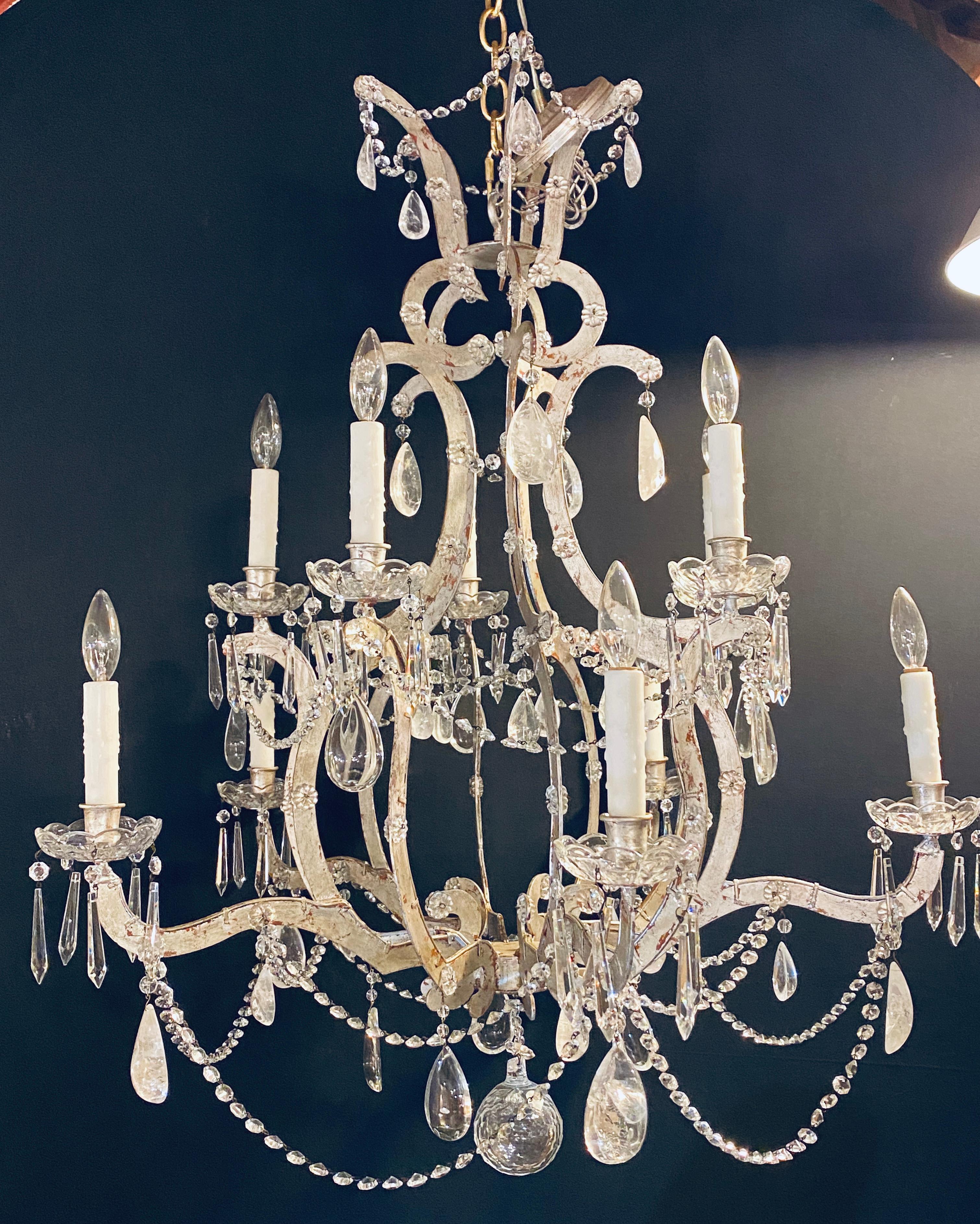 Rock crystal silver gilt & iron chandelier 10-light with multiple crystals. A large and impressive rock crystal, crystal and silver gilt metal framed chandelier.
 
 
     