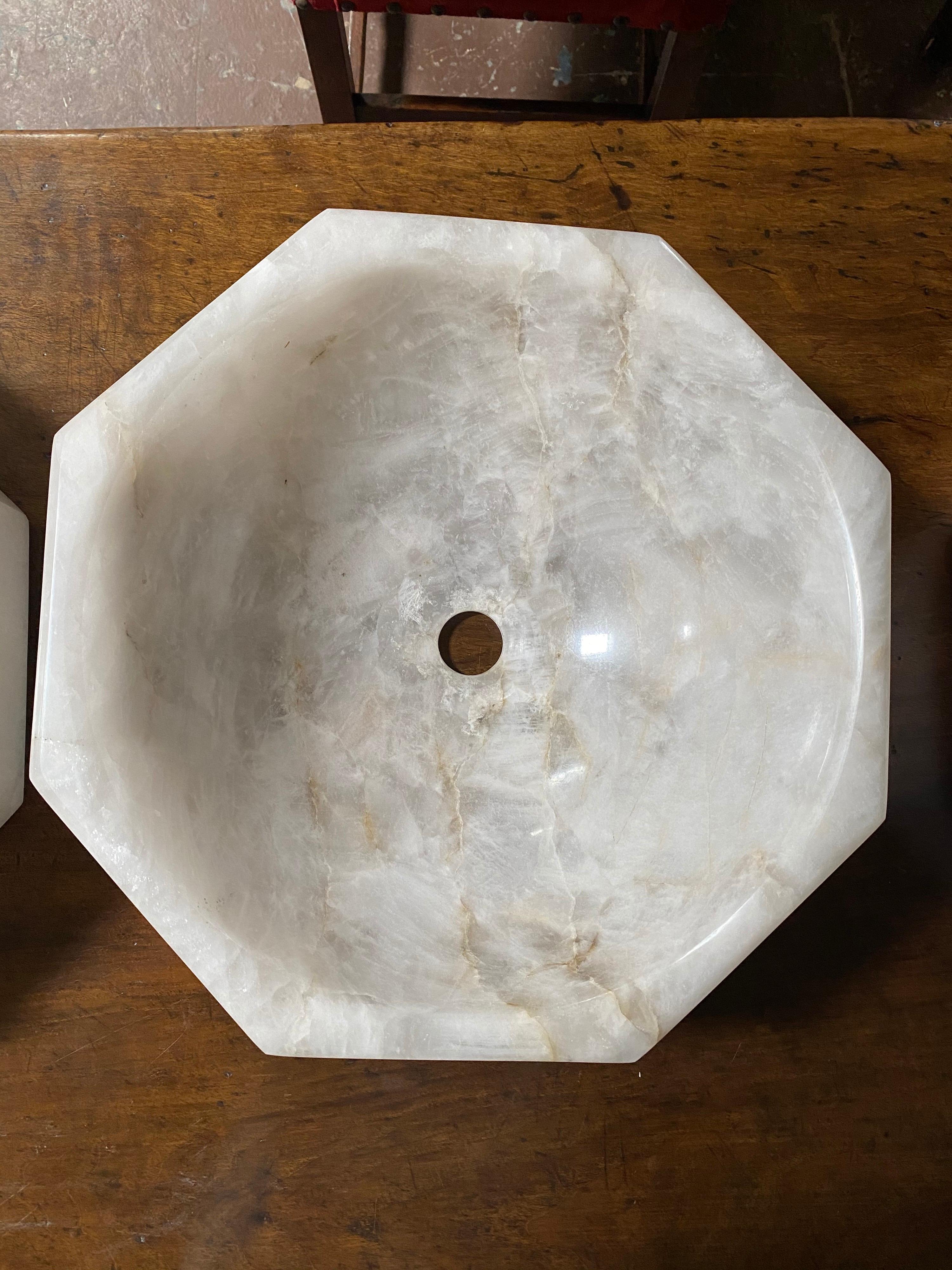 Hand carved rock crystal sink from Brazil.

If purchased we can drill and fit a drain for this item. However it will need to be sent to us.