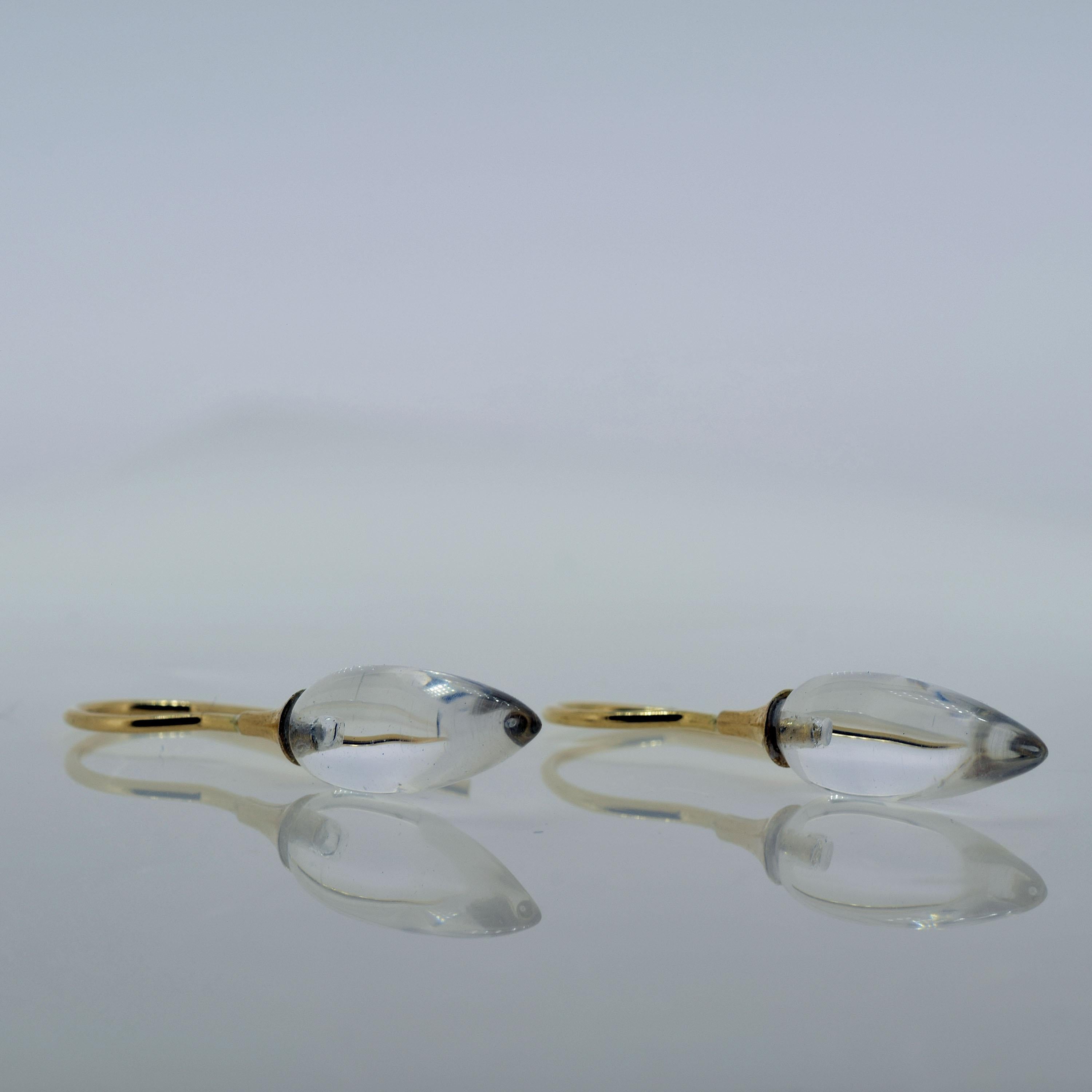 These sensuously smooth crystal earrings on 14K gold are simple, understated sophistication.  
Measure 1-1/4