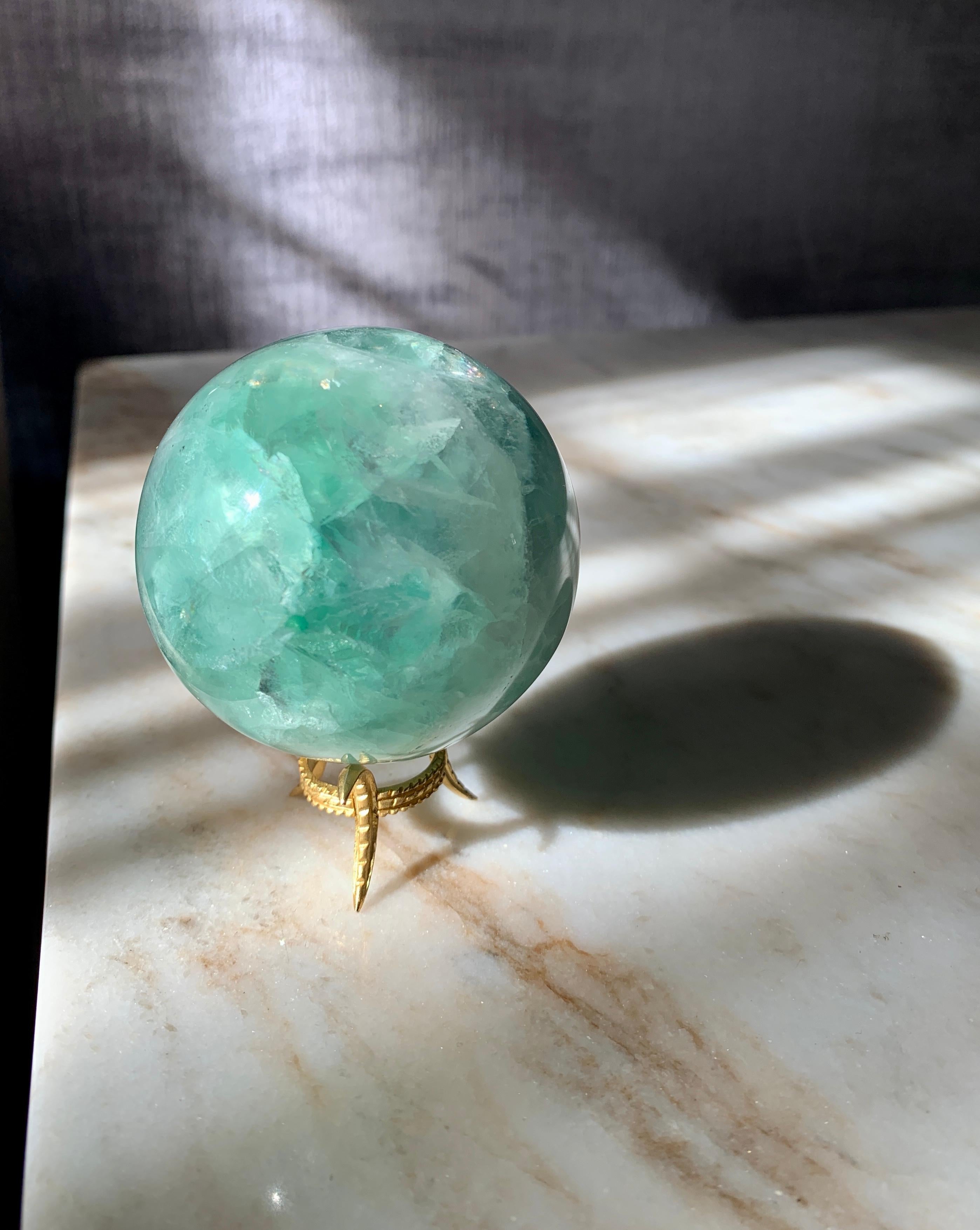 crystal ball with gold stand