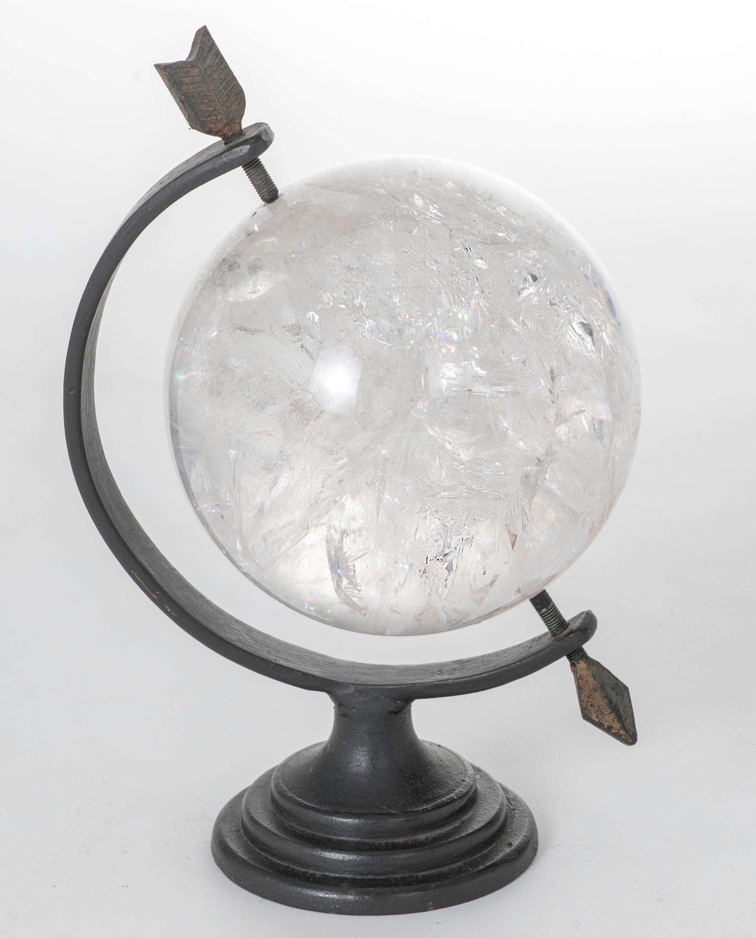 Beautifully mounted on iron stand, quartz rock crystal sphere, wonderful on your desk. Actual crystal sphere is approximately 5 1/4