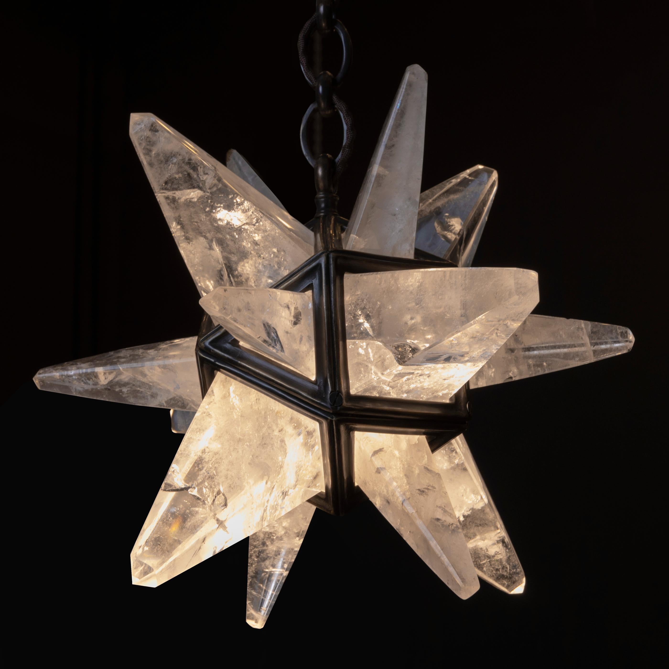 Original design made by Alexandre Vossion.
The fixture, the chain, the canopy are handmade in Paris in bronze.
The following function is antique brass.
This patina is also handmade with different oxides under the fire of the craftsman.
The