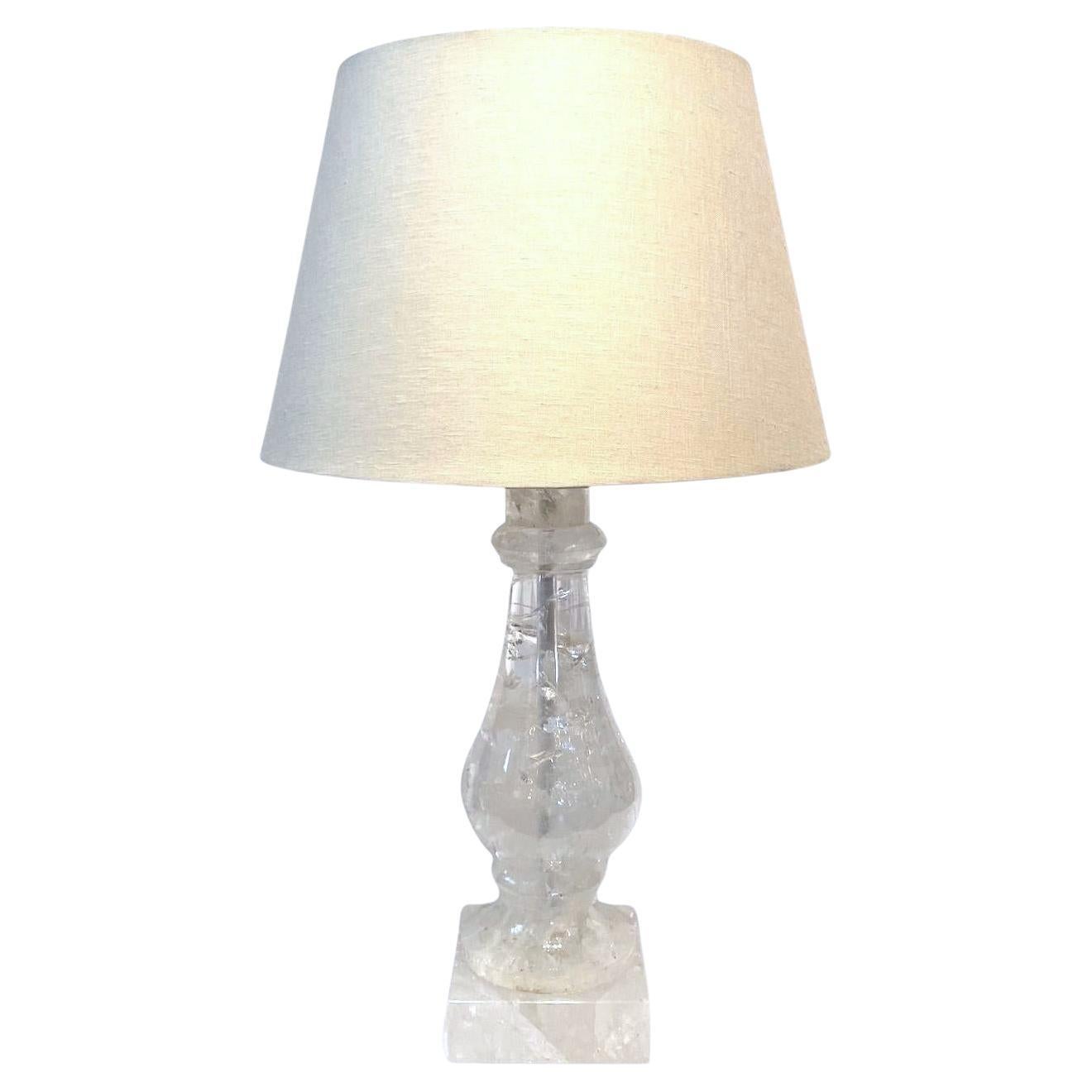 Rock crystal from Madagascar made into a lamp. Metal rod hides the wiring. Wired for USA. New off-white linen 17