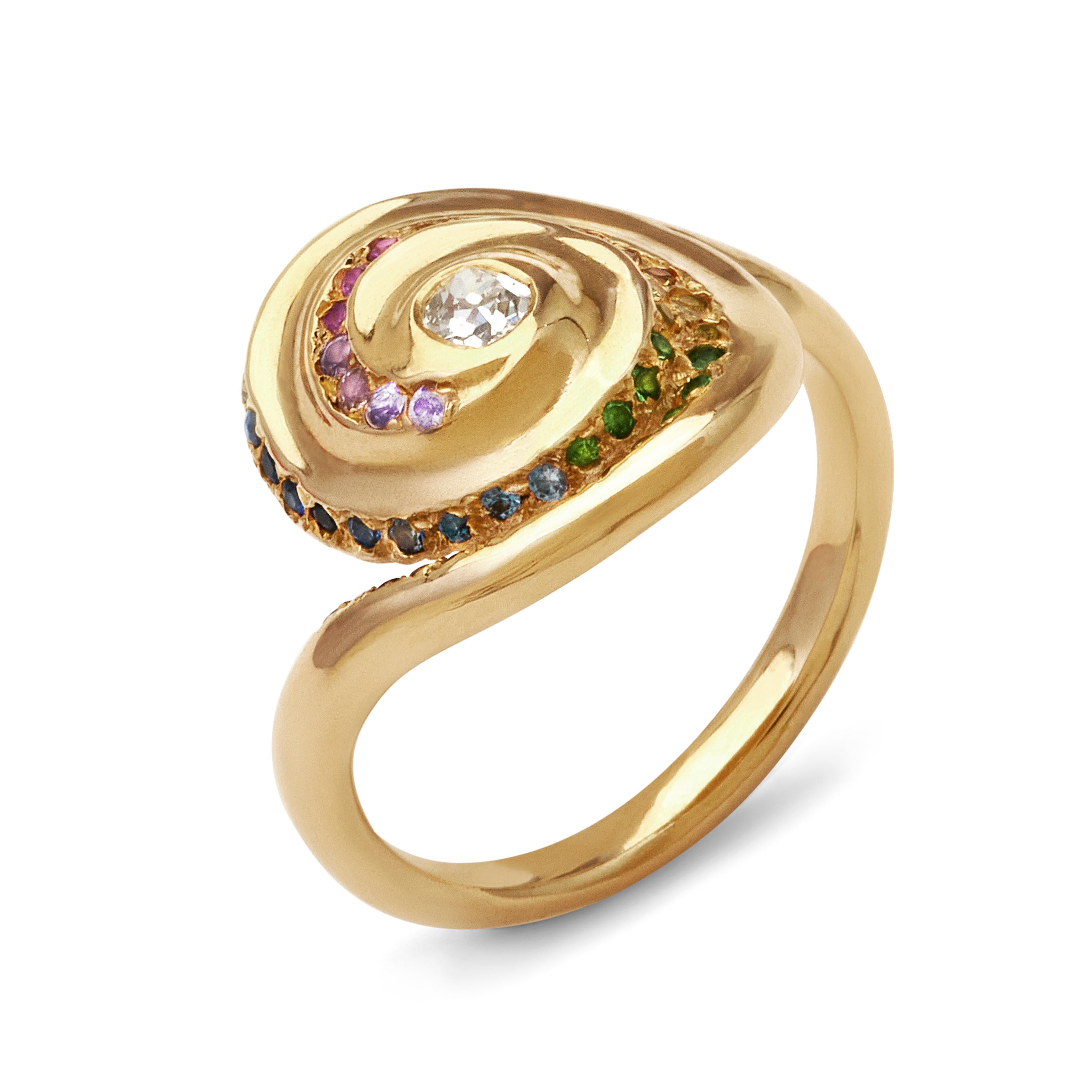 
Prepare to be utterly captivated by the mesmerizing whirlwind of vibrant colors that burst forth from this 18ct yellow gold ring, bedecked with an exquisite array of gemstones; Diamonds Sapphires, tsavorite garnets, and rubies. Brace yourself for