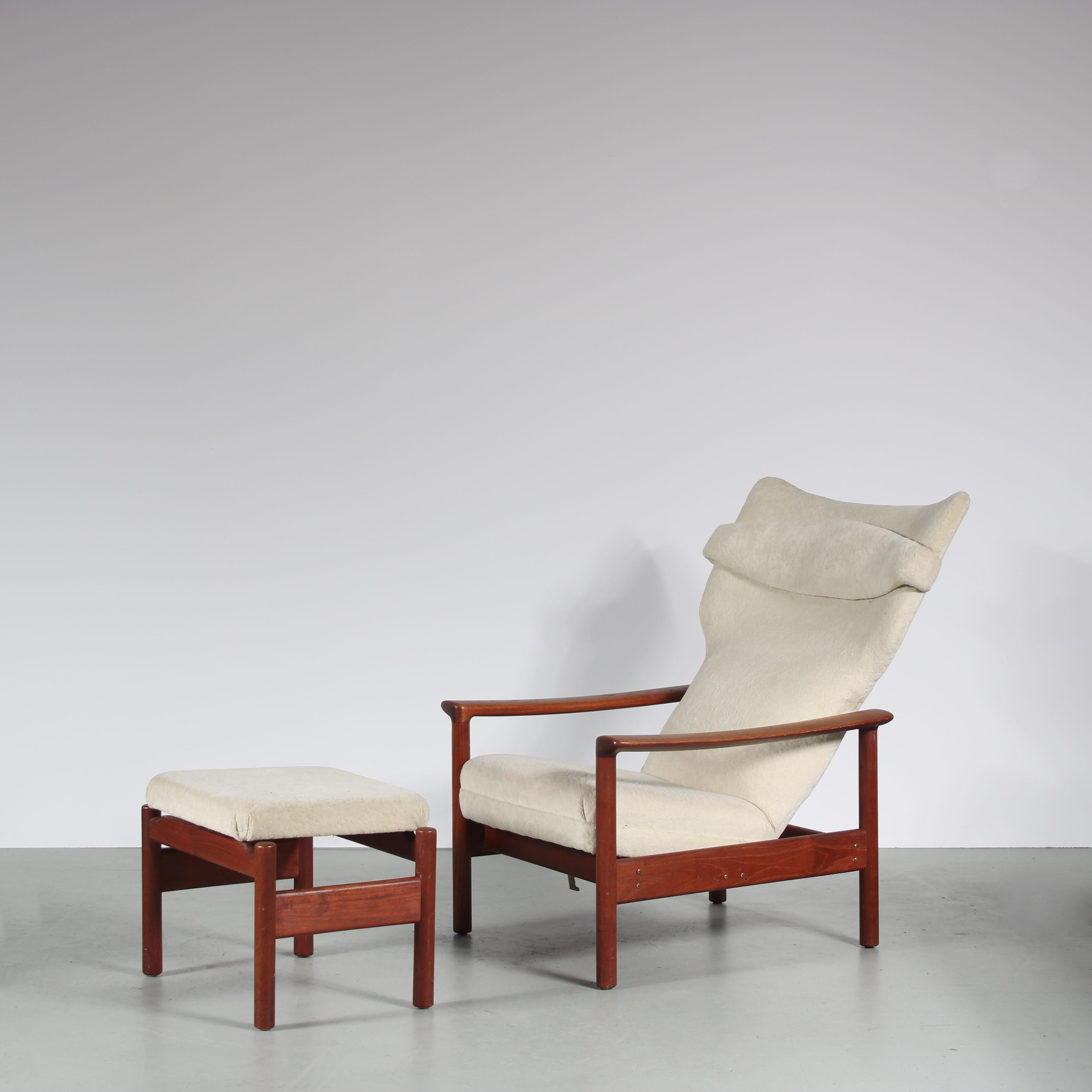 A rare “Rock Royal” chair with matching foot stool, designed by Sven Ivar Dysthe and manufactured in Norway around 1960.

Both standing on a high quality wooden base in a nice warm brown color with a beautiful finish. The seats are upholstered in
