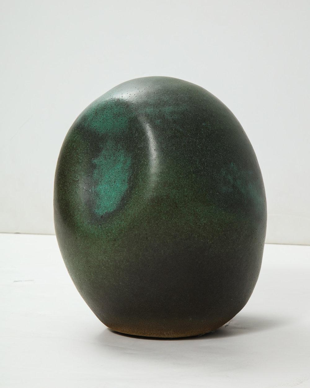 Wheel-thrown egg form with hand molded indentations, green glazes. Artist-signed to underside.