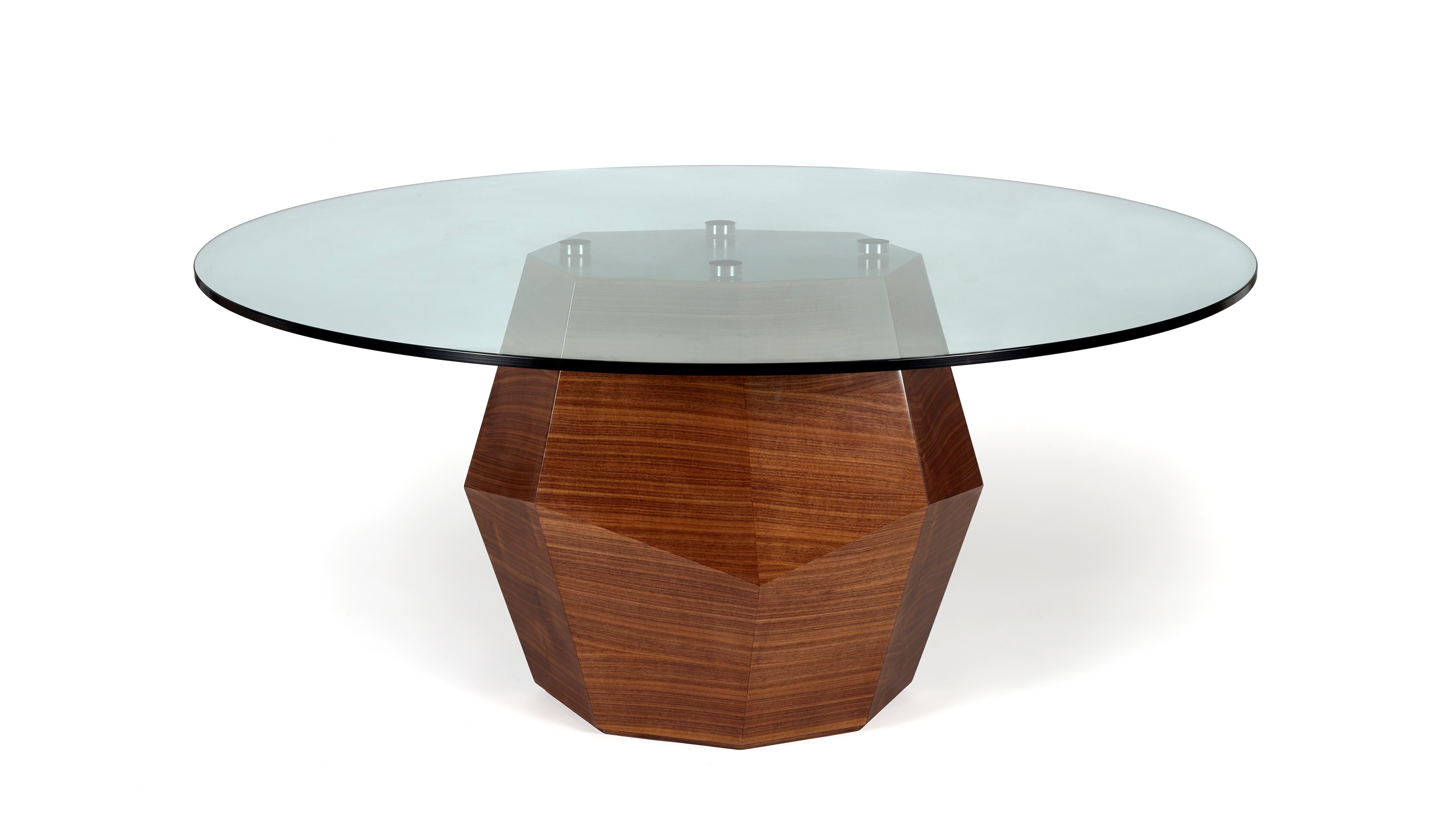 Rock Walnut Dining Table by InsidherLand
Dimensions: D 160 x W 160 x H 74 cm.
Materials: Glass, walnut veneer.
130 kg.

The robust volume of Rock dining table entirely finished in walnut veneer on an elegant faceted work that resembles the irregular
