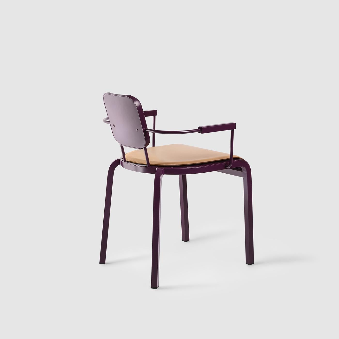 Captivating geometrical lines and a minimalist flair characterize this exquisite armchair. A statement piece of contemporary sophistication, it is entirely crafted of aluminum boasting a purple hue and is completed with a natural full-grain leather