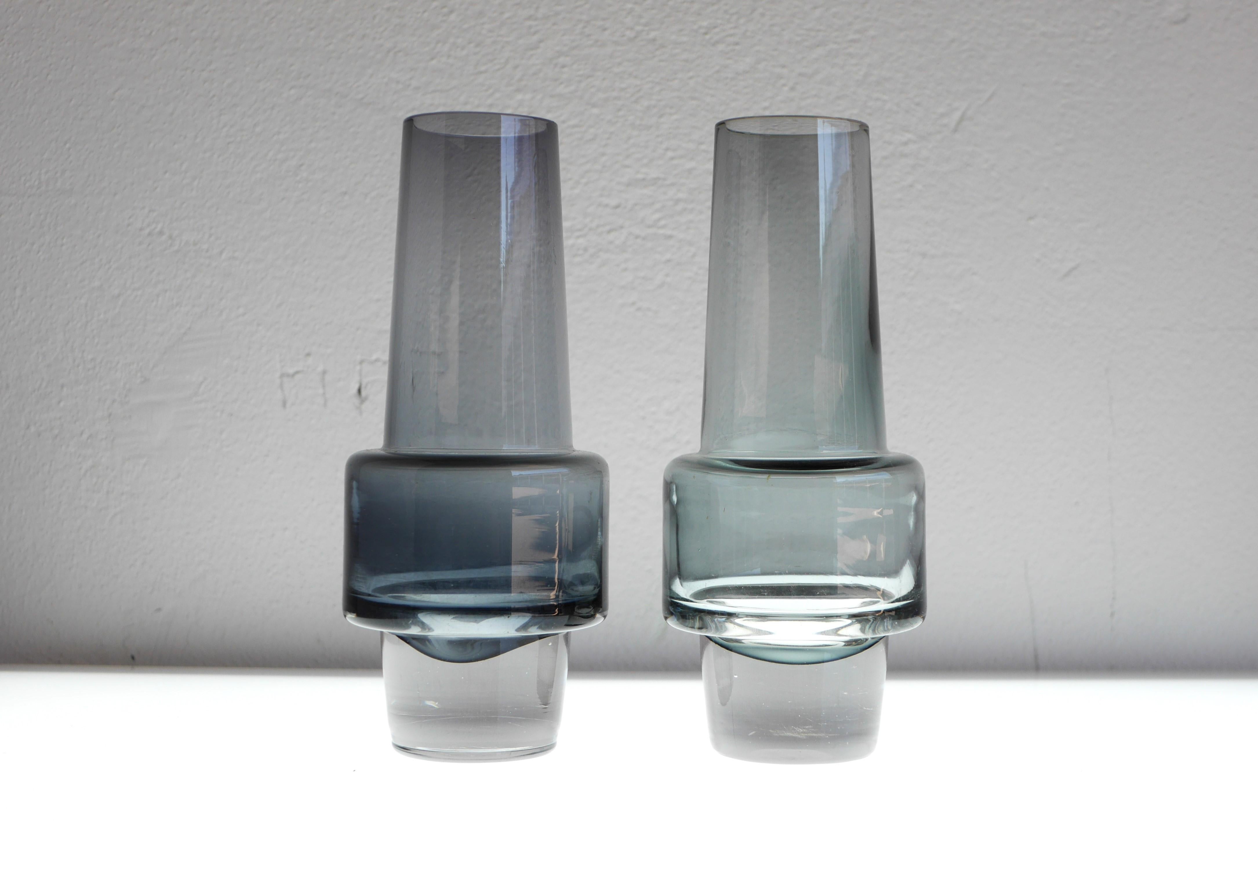 Vintage beautiful pair of sommerso glass vase, known as “Rocket” made by Inge Samuelsson for SEA, Sweden. Inspired by the space age in the 1960s these vases have a fantastic shape and they have been produced using sommerso technique. The color is a