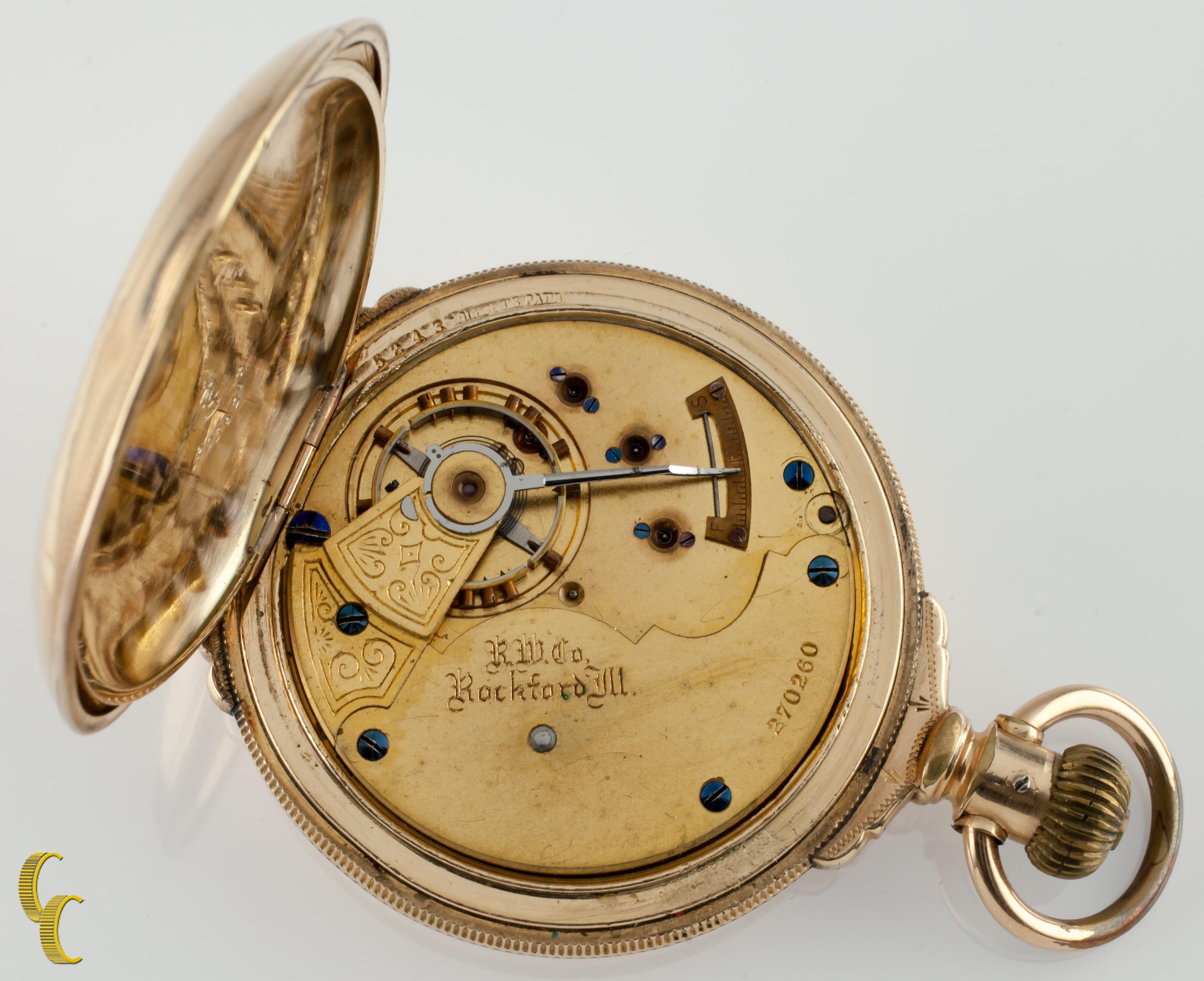 Beautiful Antique Rockford Pocket Watch w/ White Dial Including Cobalt Blue Hands & Dedicated Second Dial
14k Yellow Gold Filled Case w/ Intricate Hand-Etched Design on Front and Back of Case
Black Roman Numerals
Case Serial #2055243
15-Jewel
