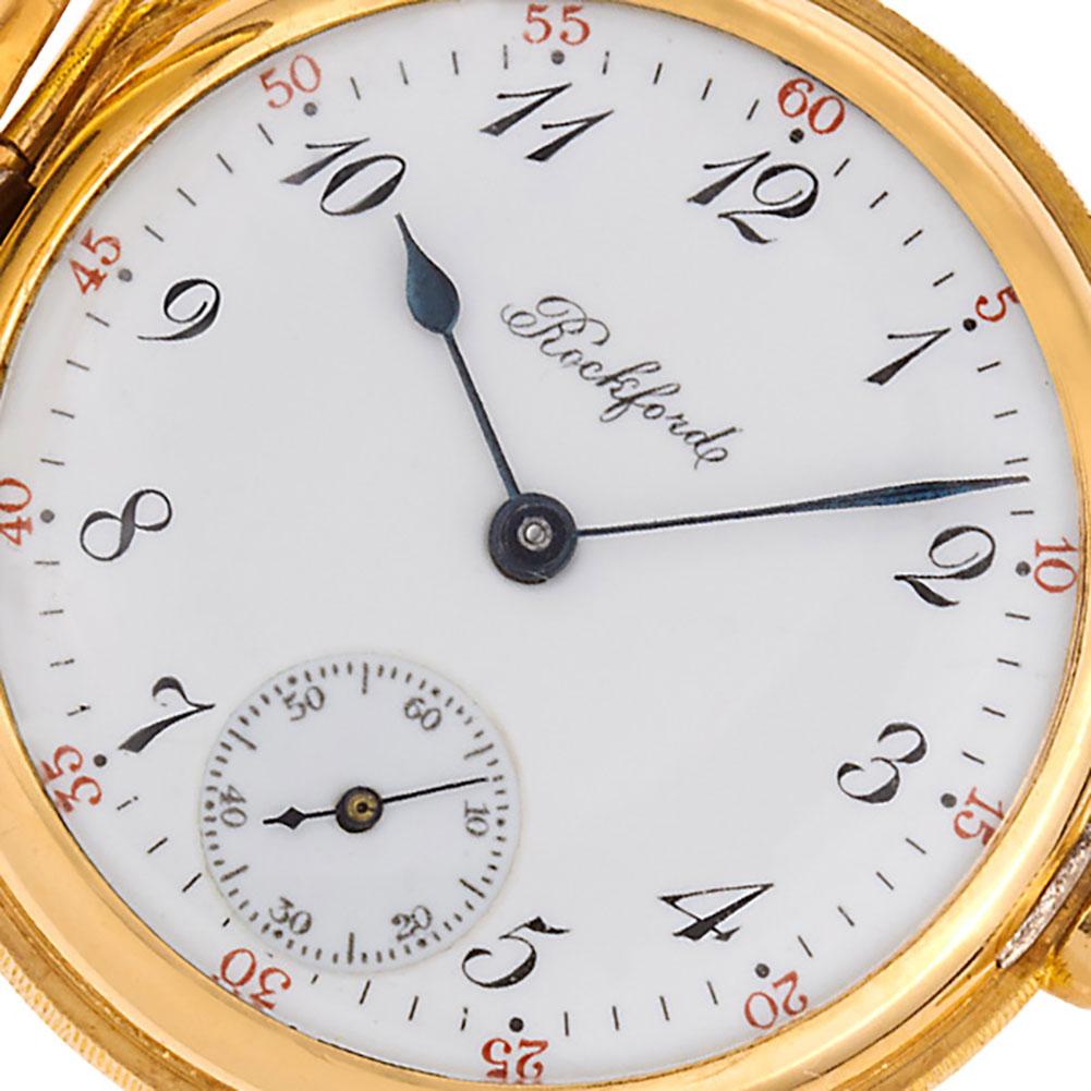 Ladies Rockford Hunter Case pocket watch, 17 jewels enamel dial and spade and whip hands in 14k yellow gold. Keystone case with a beautiful sunburst design. Manual with sub-seconds. 33mm. Circa 1913. Fine Pre-owned Rockford Watch.

Certified