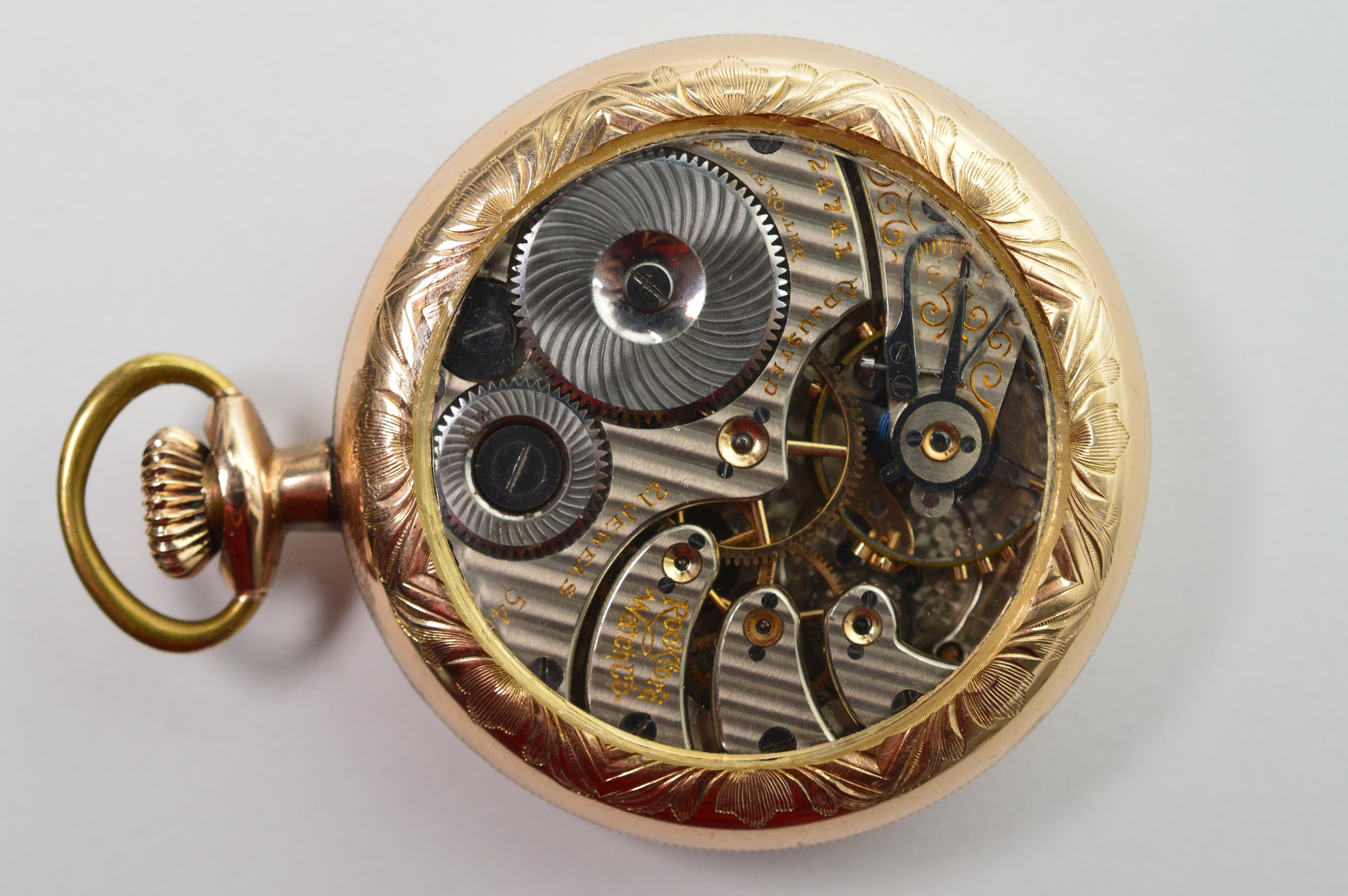 Enjoy this circa 1903 Rockford Railroad Style Pocket Watch with fancy engraved brass case. This fabulous size 16S American made piece is restored with a display back for a mesmerizing view of its beautiful fancy acid etched twenty one jewel