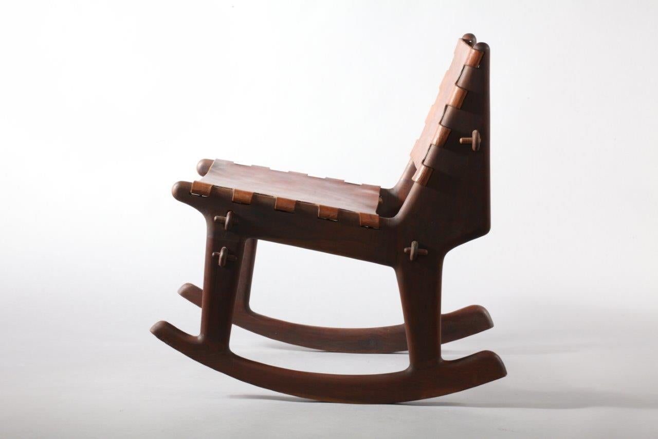 Rocking chair,
designed Angel Pazmino for Muebles de Estilo,
Equador 1960.
Solid teak wood, brown leather.