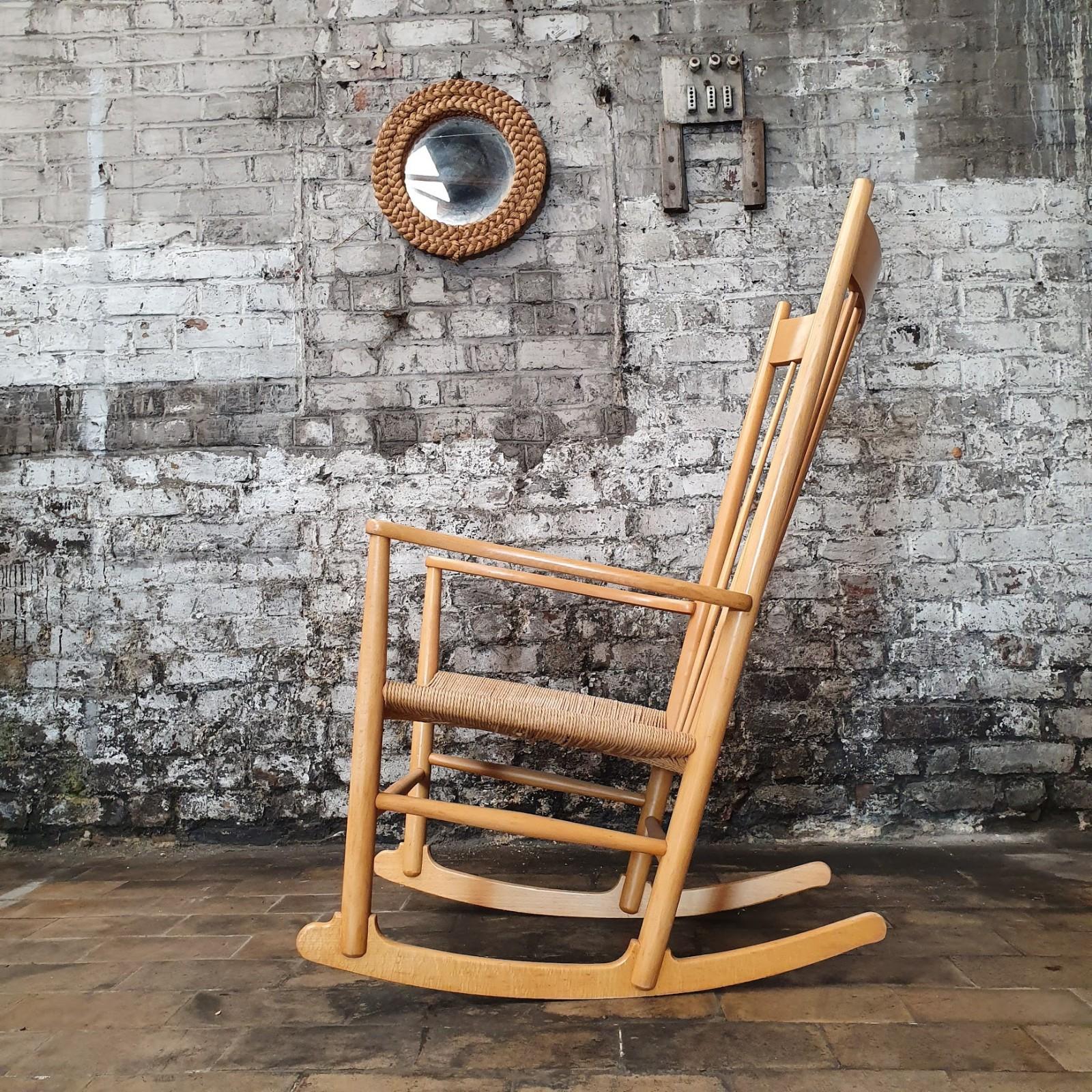 Iconic rocking chair, model J16, designed by Hans J. Wegner in 1944 and manufactured by Fredericia Furniture in the 1960s. 

 
