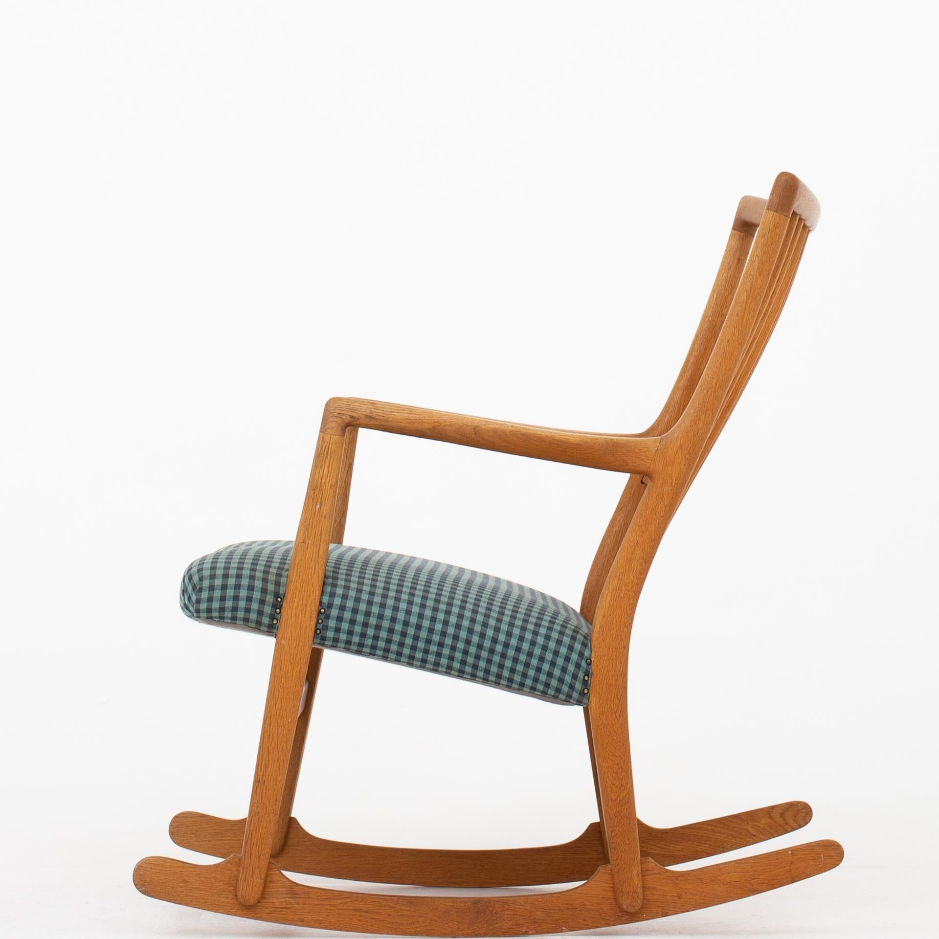 ML 33 - Rocking chair in oak with wool seat. Design, 1940. Maker Mikael Laursen.