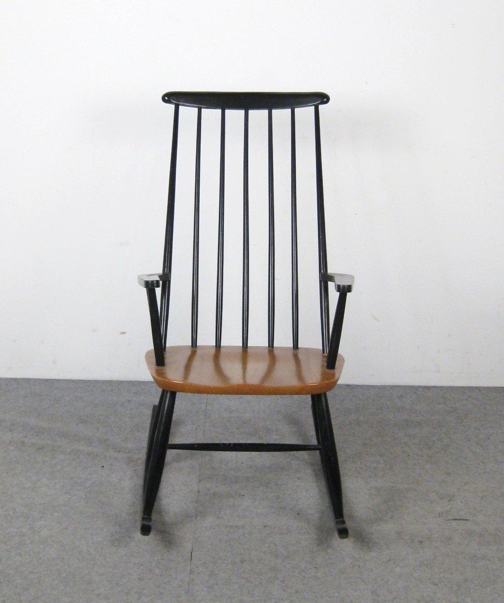 Schwarz lackierte Sitzgelegenheiten aus blondem Holz mit Buchenstruktur, entworfen in den späten 1950er Jahren von Ilmari Tapiovaara für Asko, Finnland. Gebrauchsspuren an den Armlehnen und an der Fußstütze.