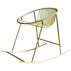 Rocking chair in metal matte brass finish made in Italy