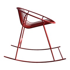 Rocking chair in metal powder coated in red made in Italy in and outdoor.