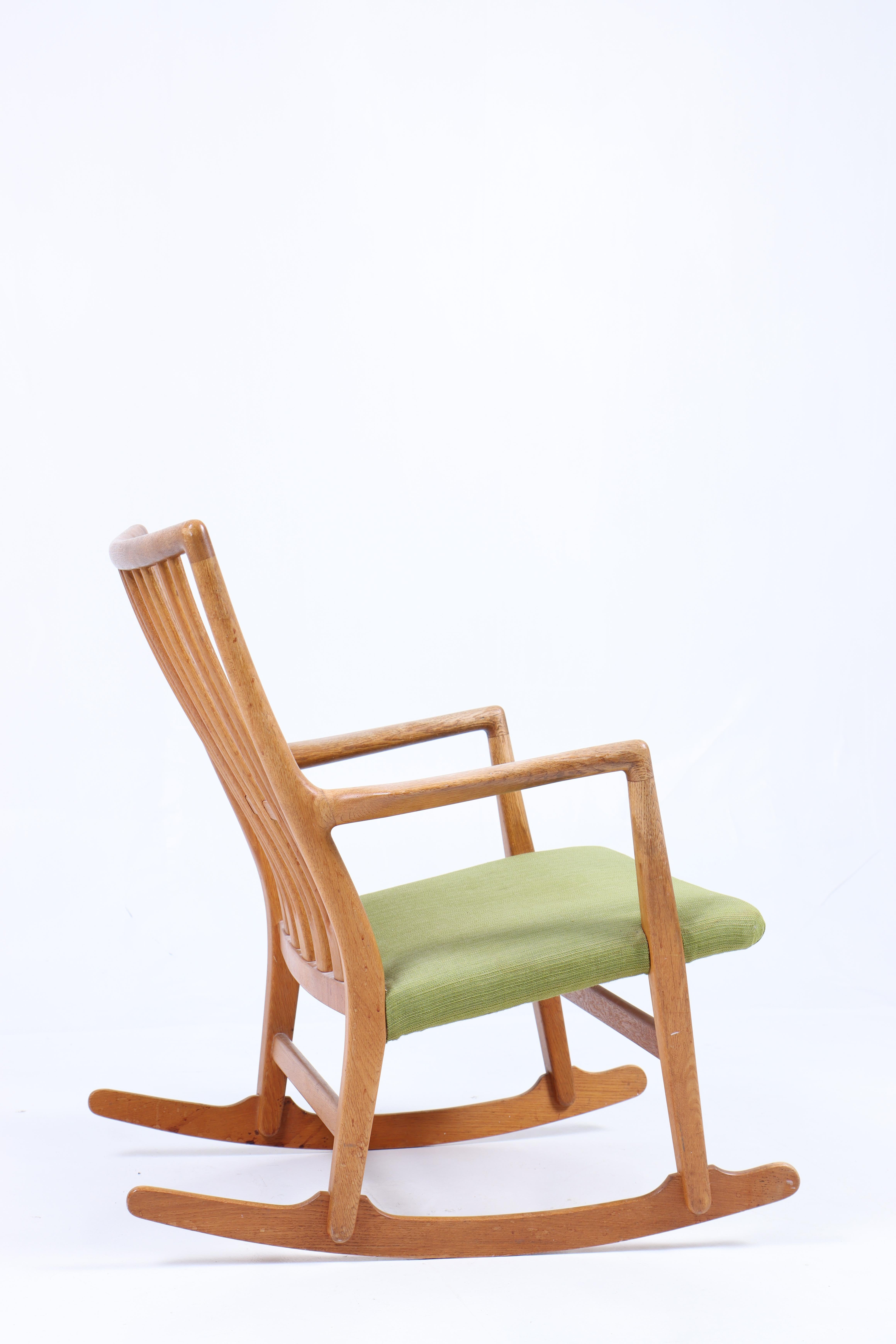 Danish Rocking Chair in Oak by Hans Wegner, 1950s For Sale