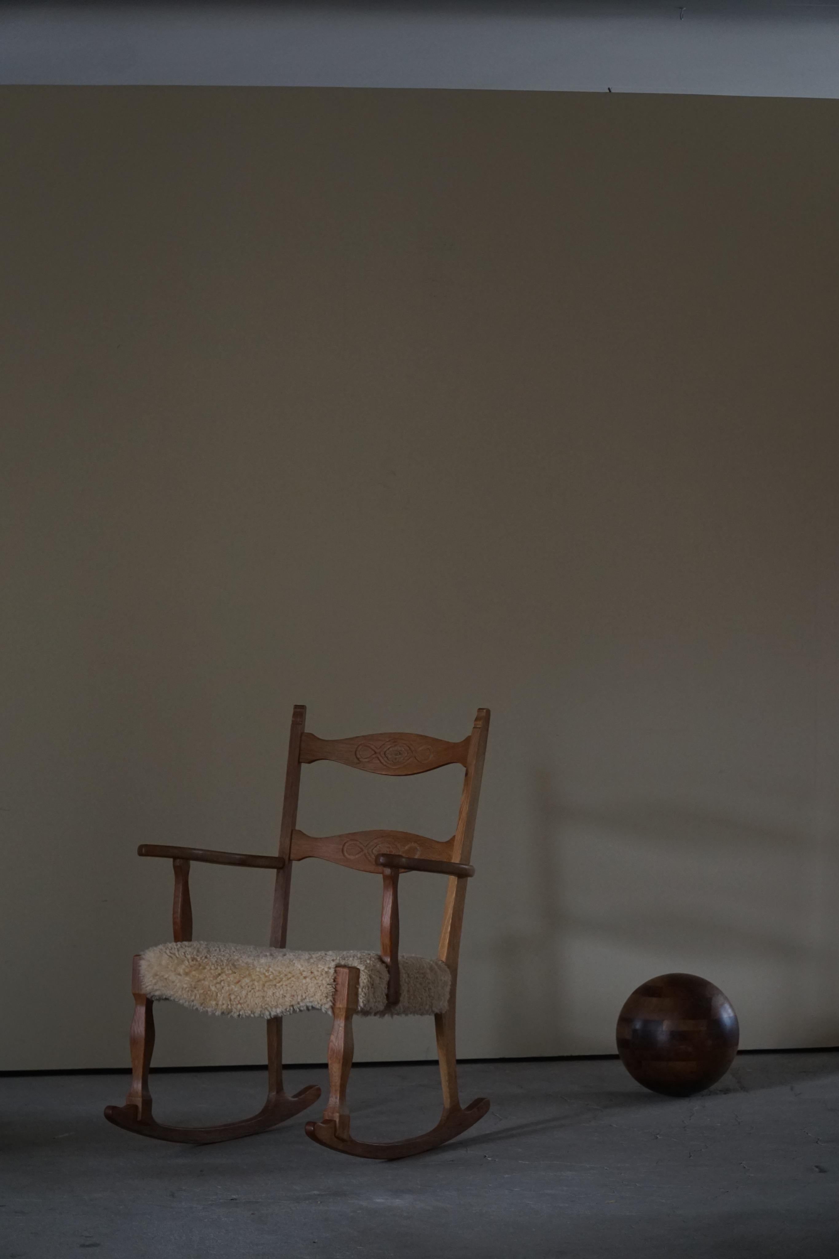 Rocking Chair in Oak, Seat Reupholstered in Lambswool, Henning Kjærnulf, 1960s 2