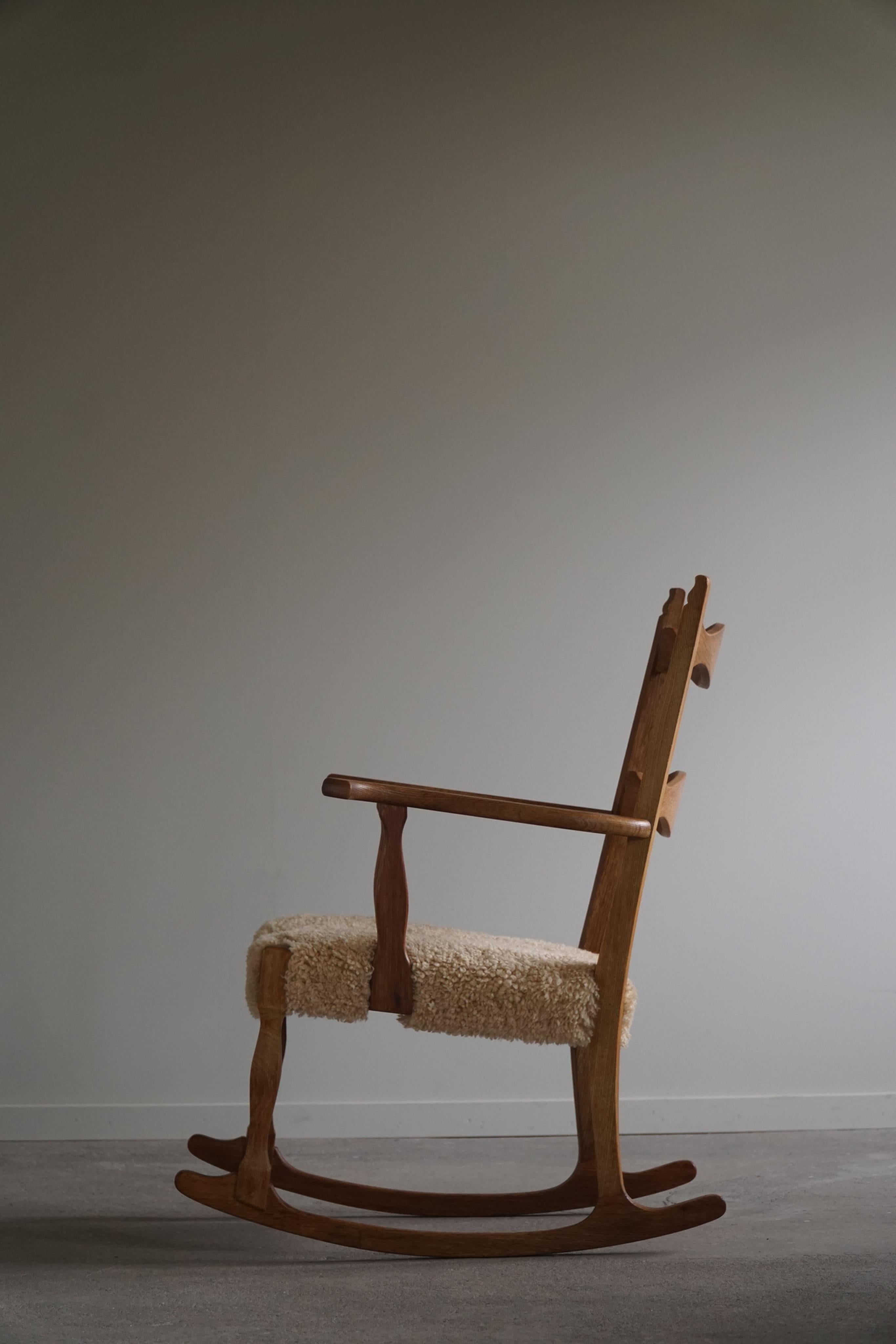 Rocking Chair in Oak, Seat Reupholstered in Lambswool, Henning Kjærnulf, 1960s In Good Condition In Odense, DK