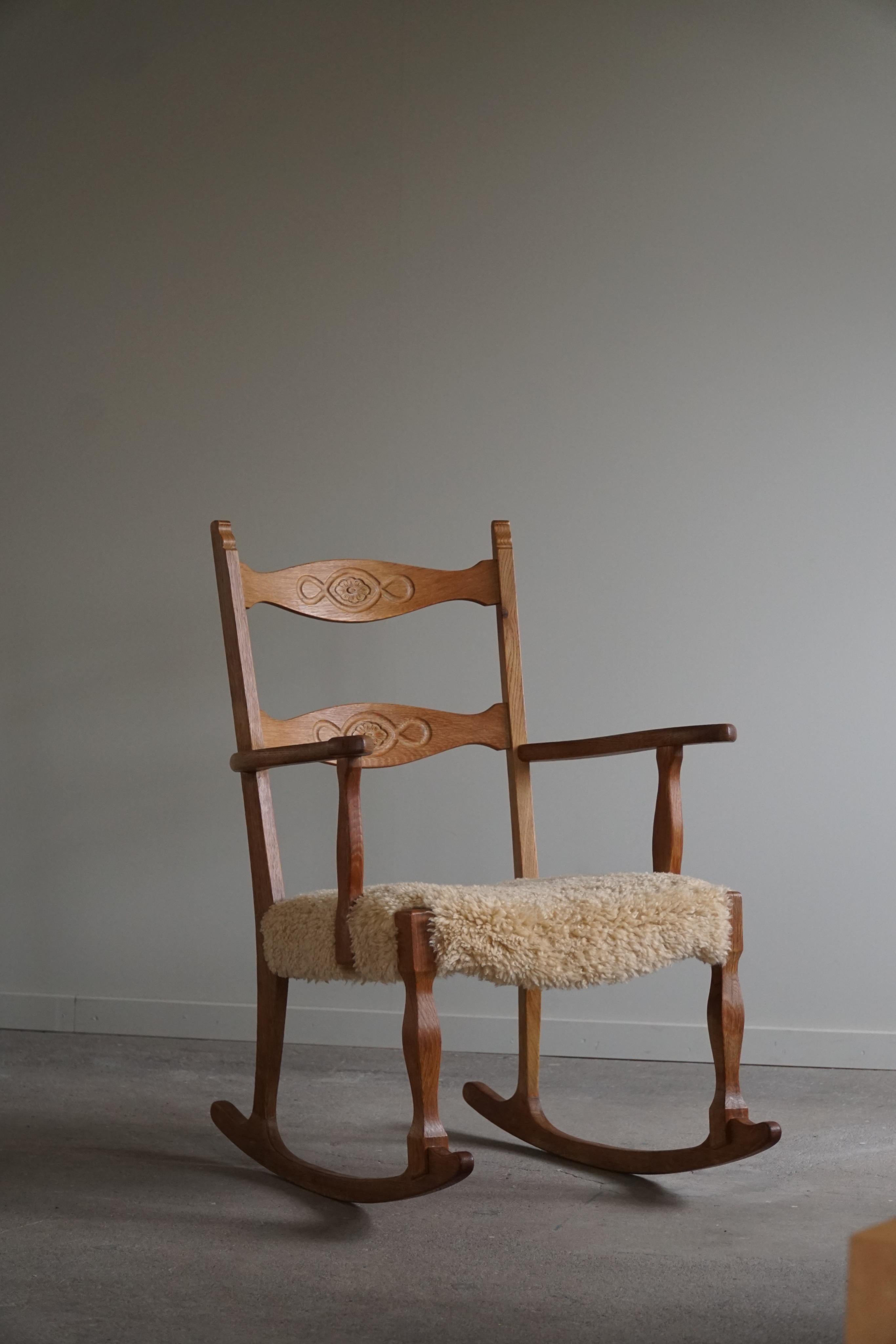 Rocking Chair in Oak, Seat Reupholstered in Lambswool, Henning Kjærnulf, 1960s 1