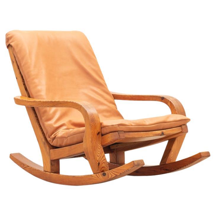 Rocking chair in pine and leather, France 1970s For Sale
