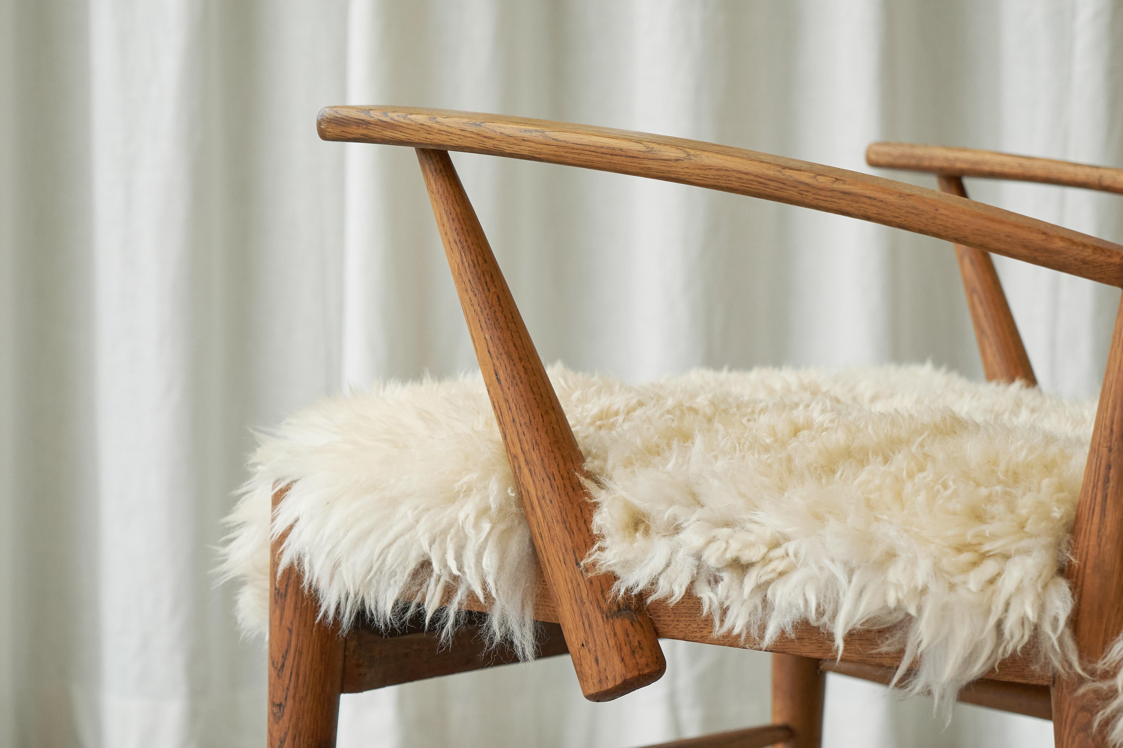Hand-Crafted Rocking Chair in Solid Oak and Sheepskin, France 1960s For Sale