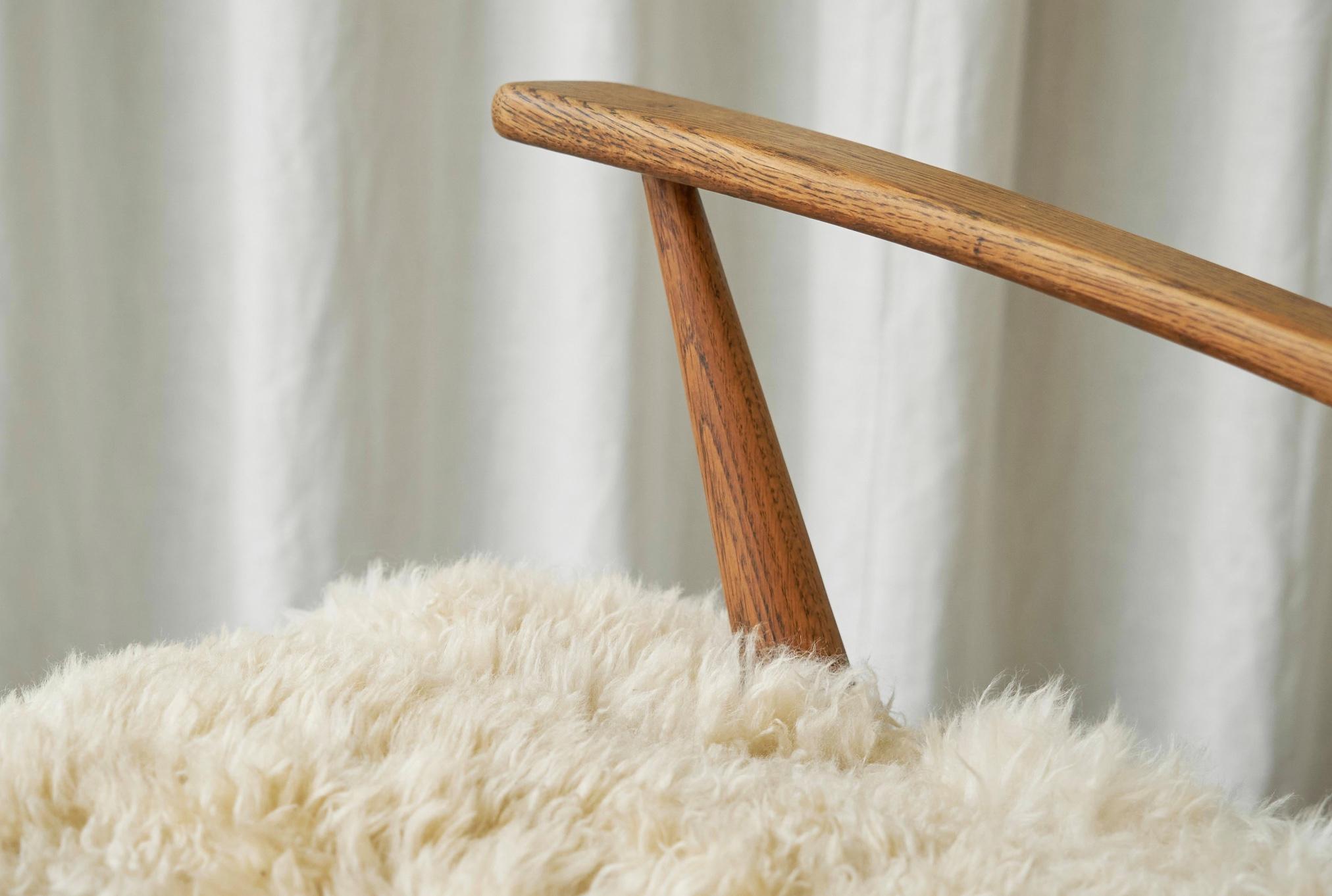 Hand-Crafted Rocking Chair in Solid Oak and Sheepskin France 1960s For Sale
