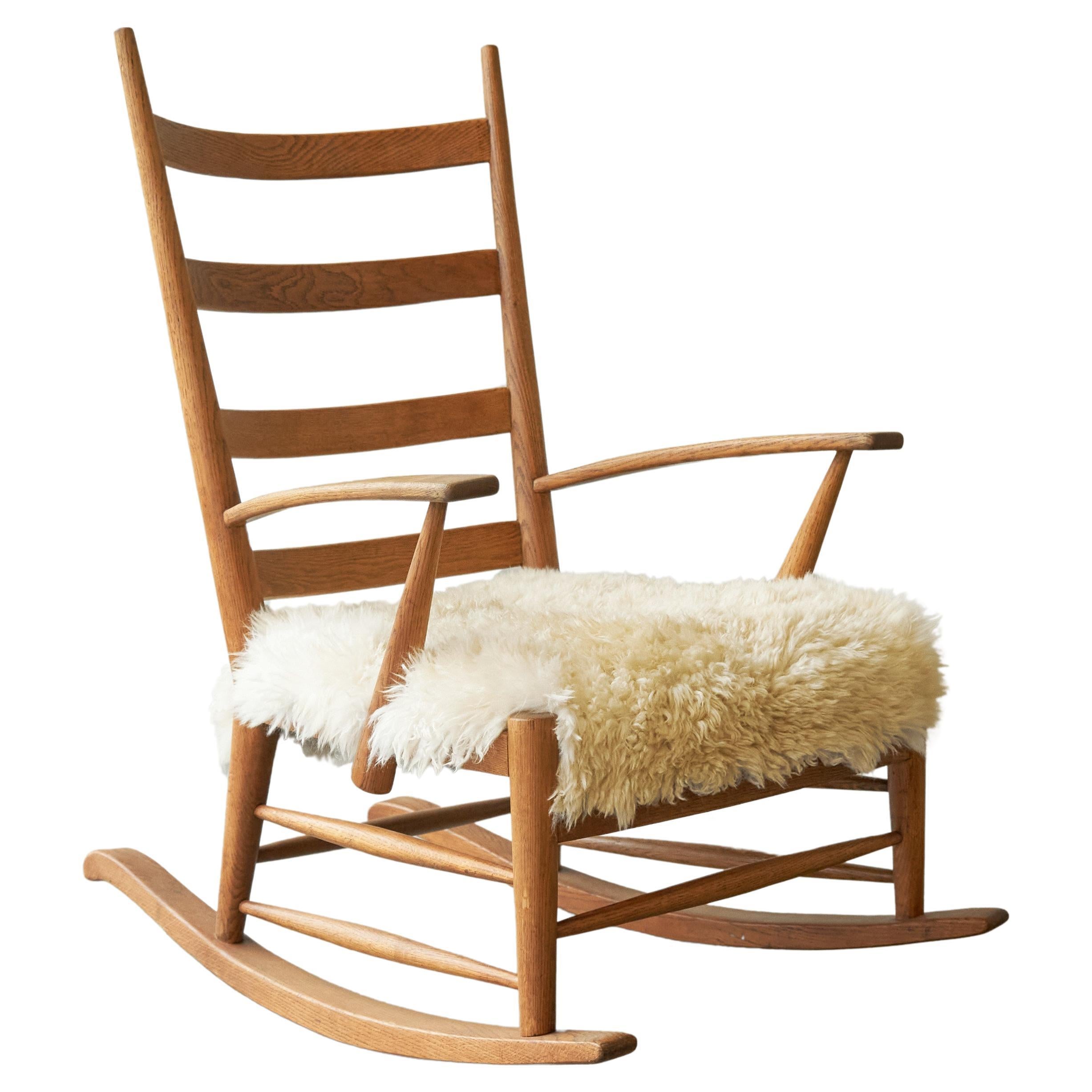 Rocking Chair in Solid Oak and Sheepskin, France 1960s