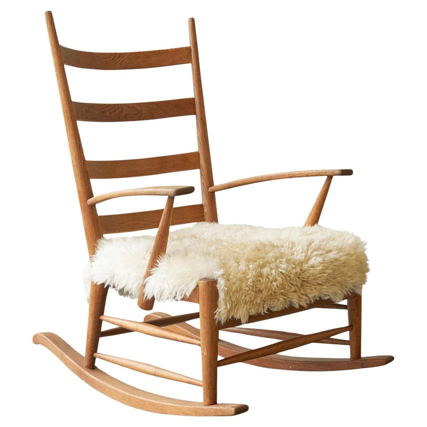 Rocking Chair in Solid Oak and Sheepskin France 1960s