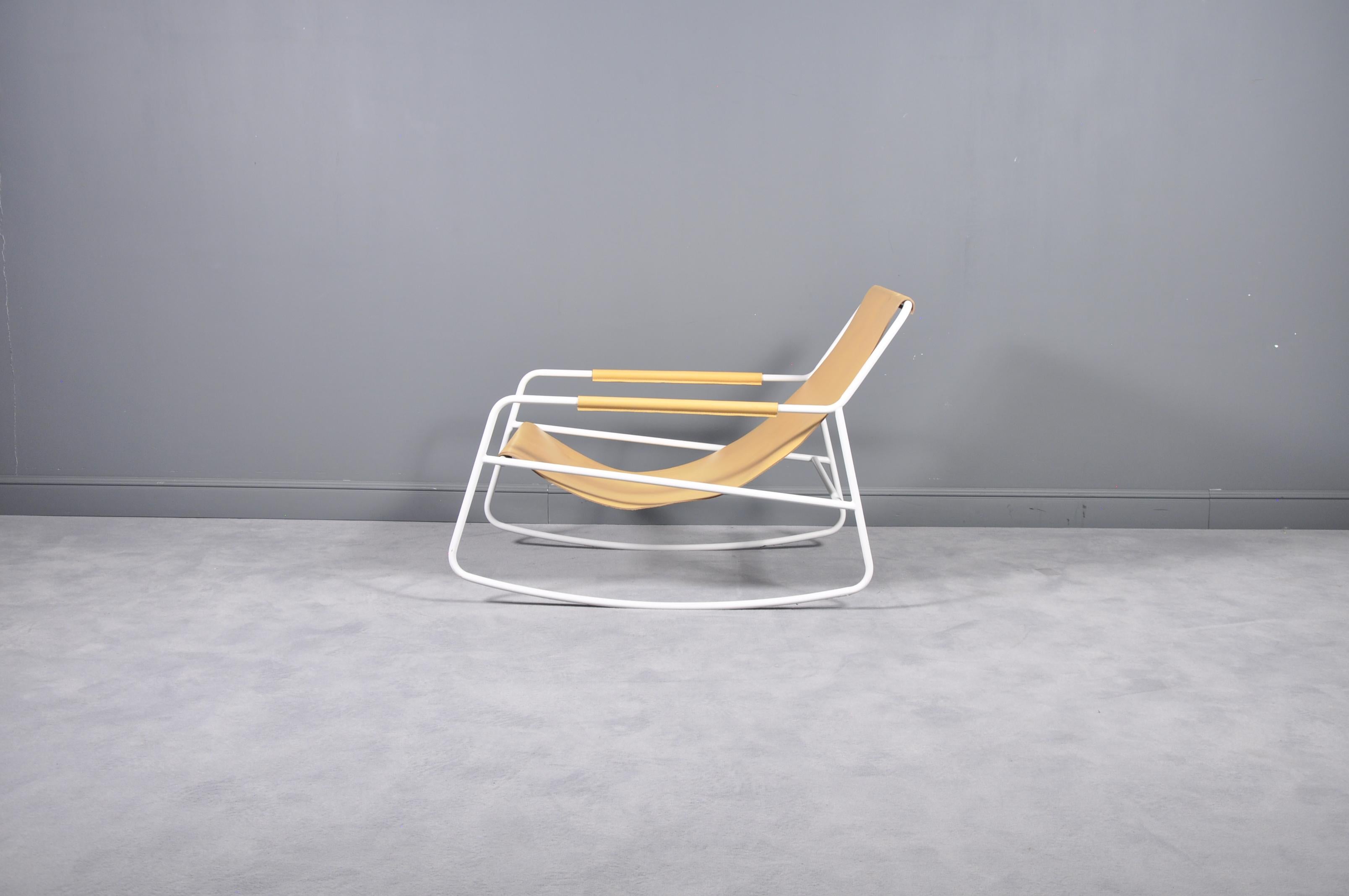 Rocking chair in steel frame and sling leather in style of Muller Van Severen.