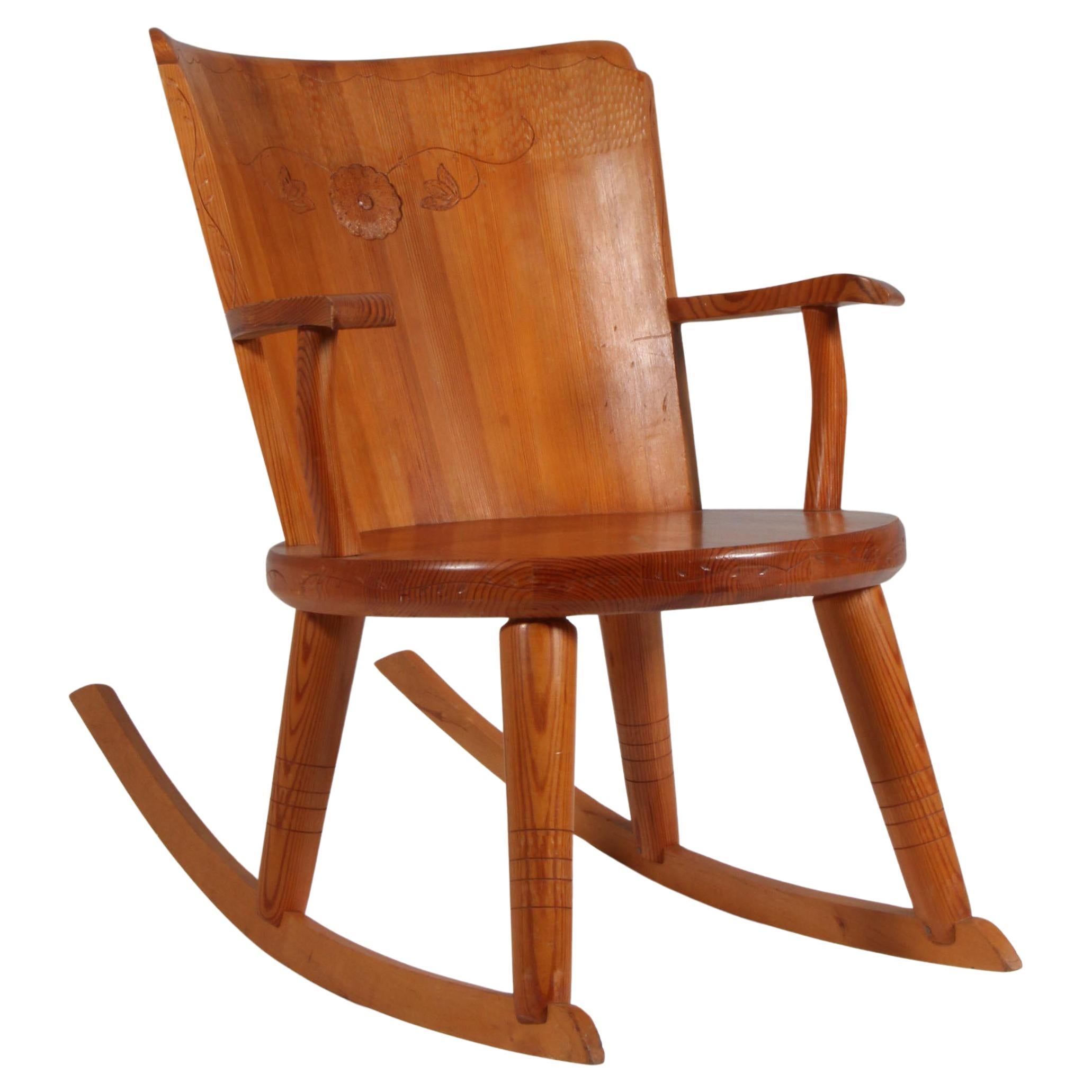 Rocking chair made in solid pine, Sweden 1970s For Sale