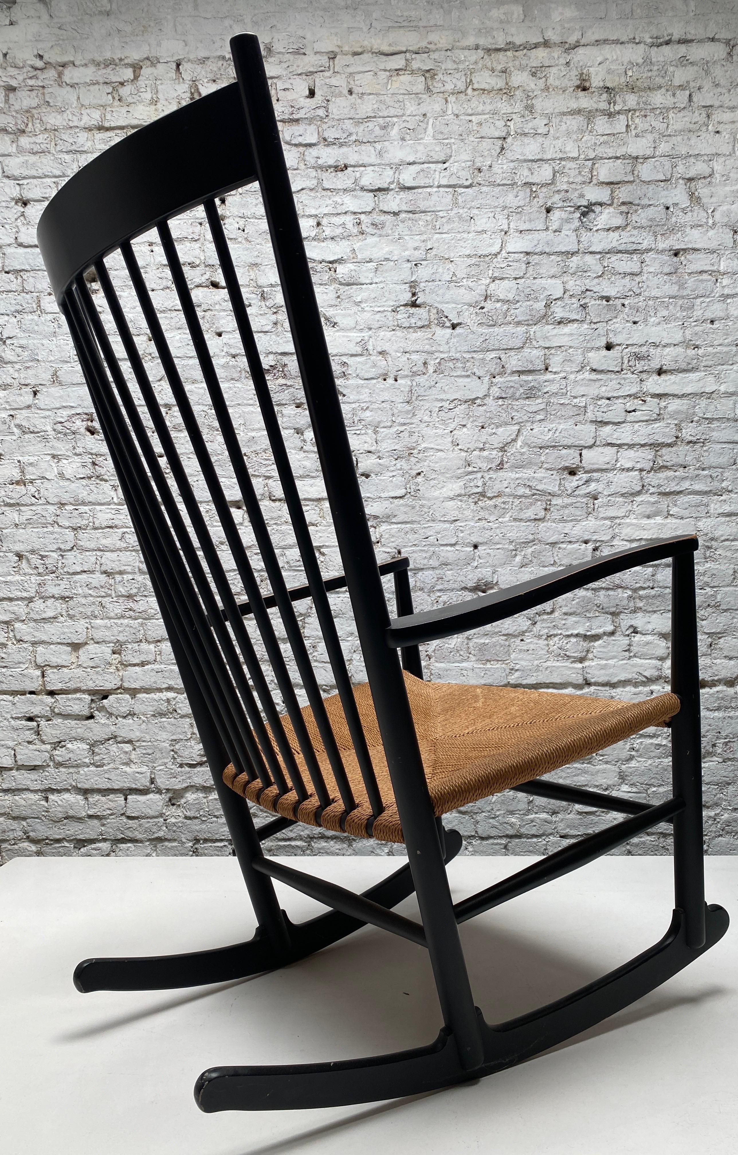 Rocking chair designed by Hans Wegner for FDB Møbler, Denmark 1950’s. This iconic rocking chair Model No.J.16 -has a spindled back, curved armrests in beech and paper-cord seat all in its original finish. Very well presented original condition. Very