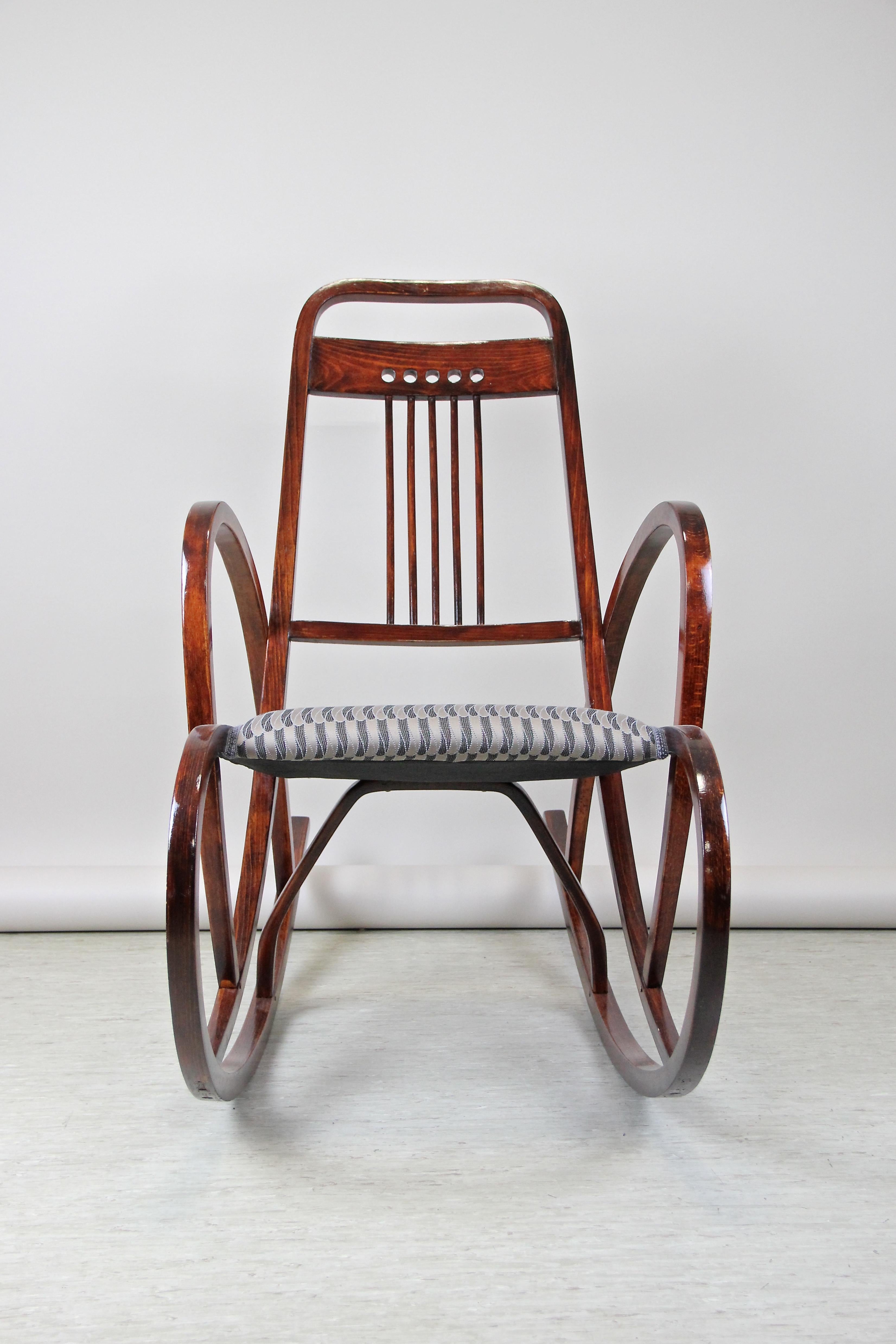 Outstanding rocking chair, model No. 511 out of the famous company of Thonet Vienna/ Austria circa 1905, designed by world renown architect Marcel Kammerer. The very pleasing design makes the bentwood chair an absolute timeless seating masterpiece