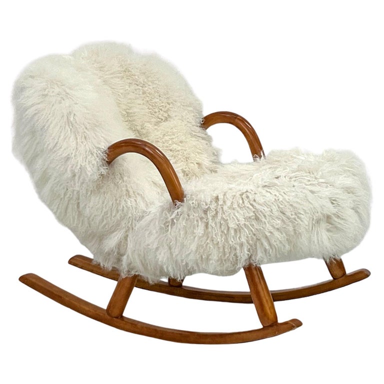 Chaise à bascule Rocking Clam, en peau de mouton bouclée d'Arnold Madsen,  Madsen and Schubell, 1944 En vente sur 1stDibs | chaise arnold