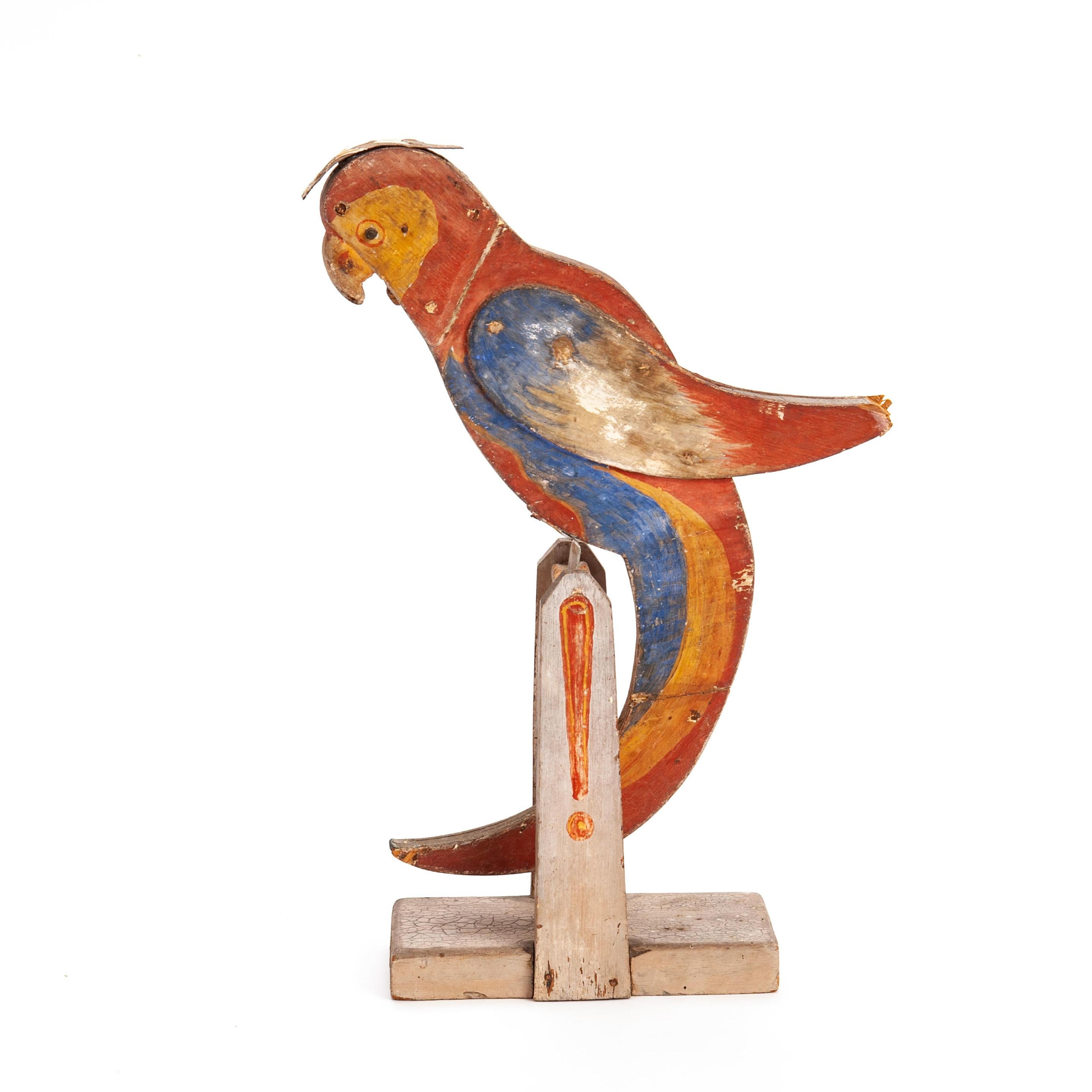 Ref: KA032

Folk art rocking parrot, original paint. 

England, circa 1920. 


Measurements: H: 36cm (14.2