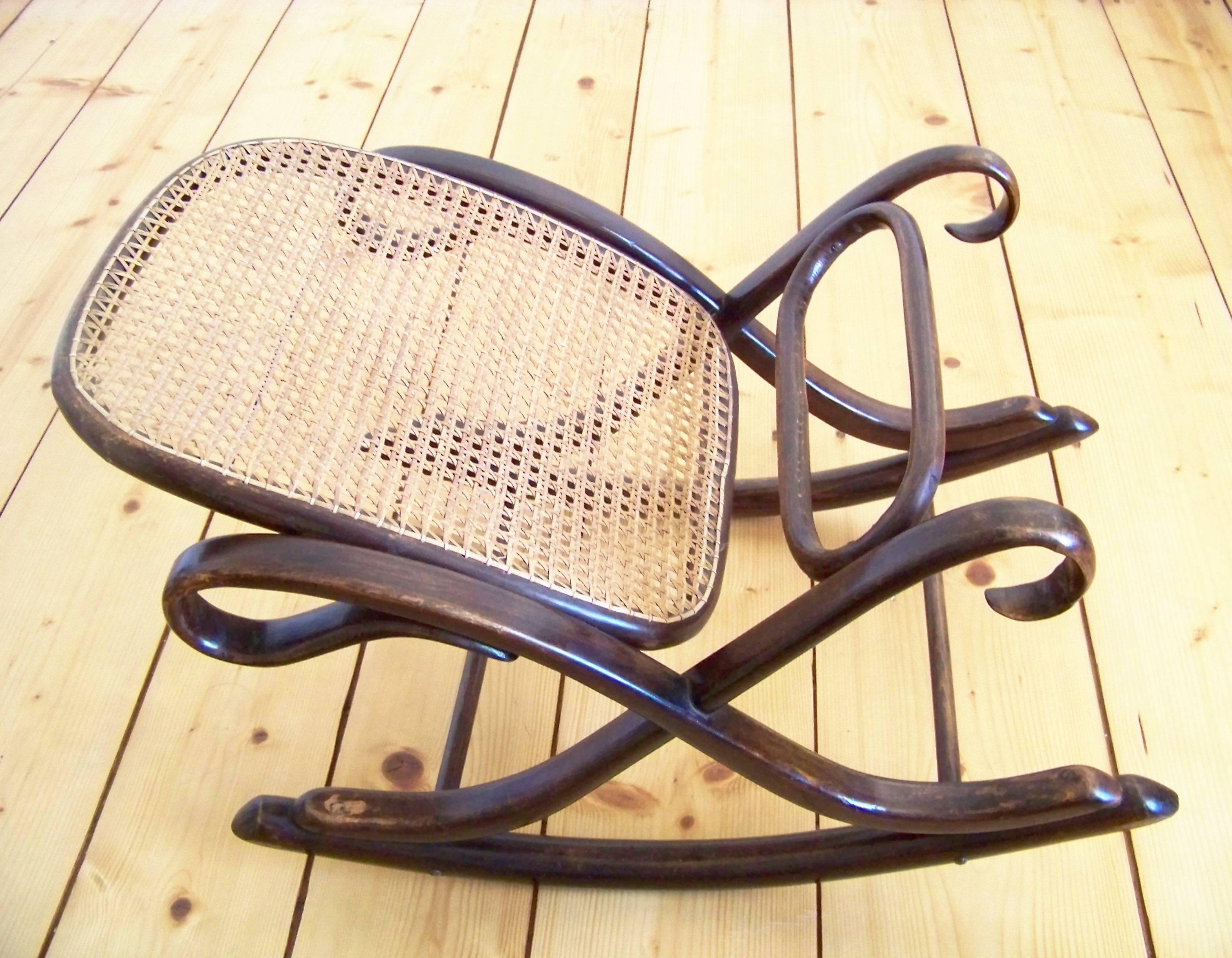Manufactured in Austria by the Gebrüder Thonet Company. In the production program was included circa 1879. Marked with fragment of paper label, which is used after year 1918. Original state.
 