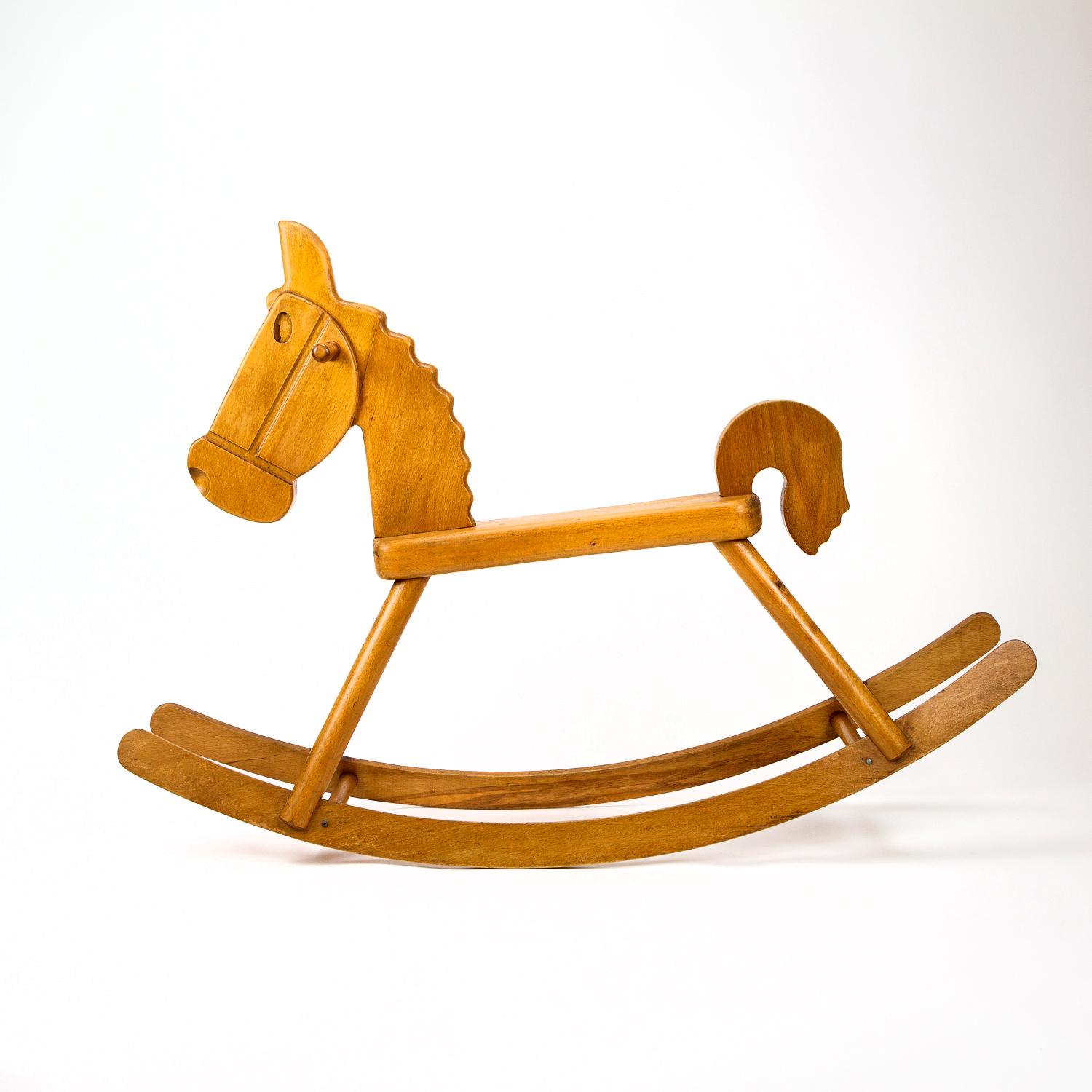 Danish rocking horse in beech with newly turned sapele hand grips, Denmark, 1970s.
  