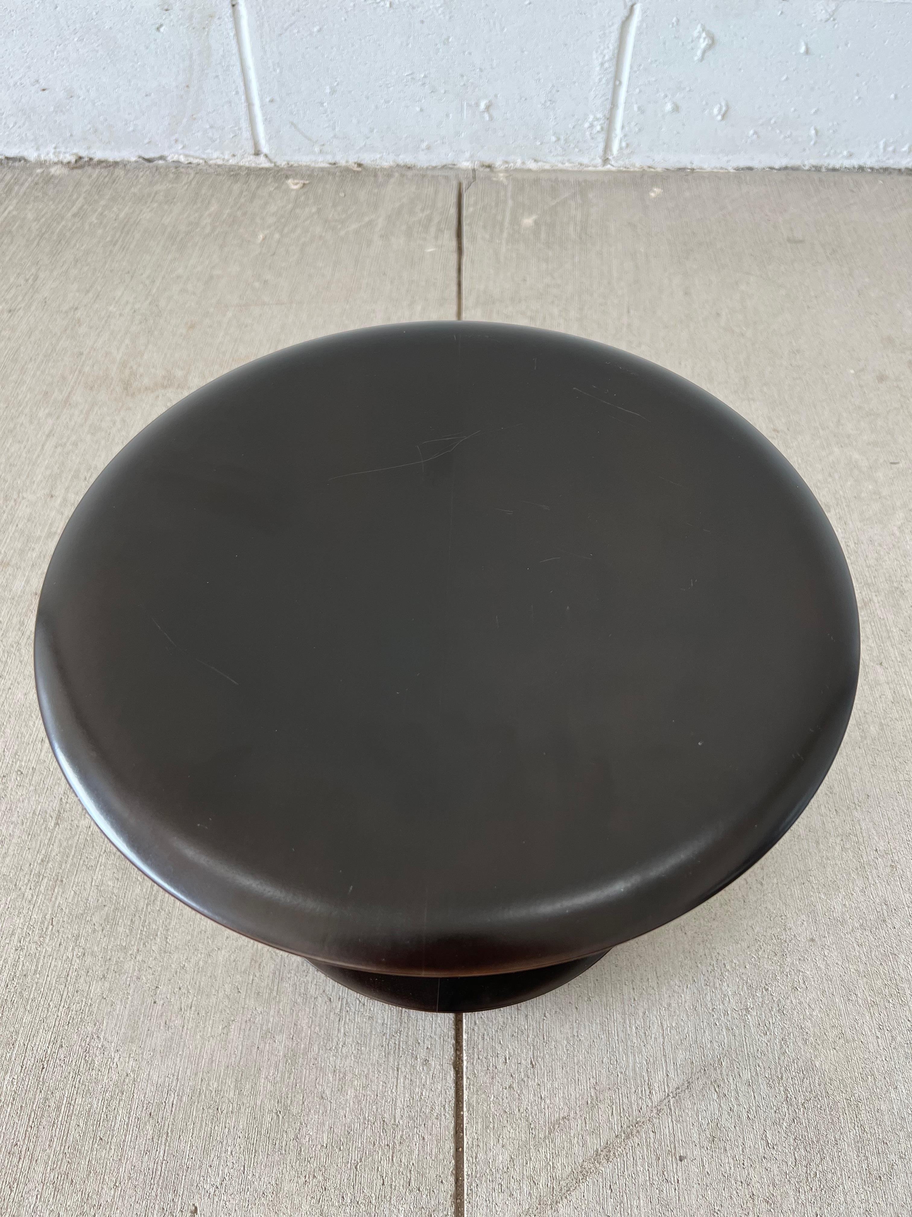 Isamu Noguchi iconic rocking stool in dark stained wood with polished chrome accents, 14” diameter x 10”high. Vitra production. Blonde wood stool is available in a separate listing.