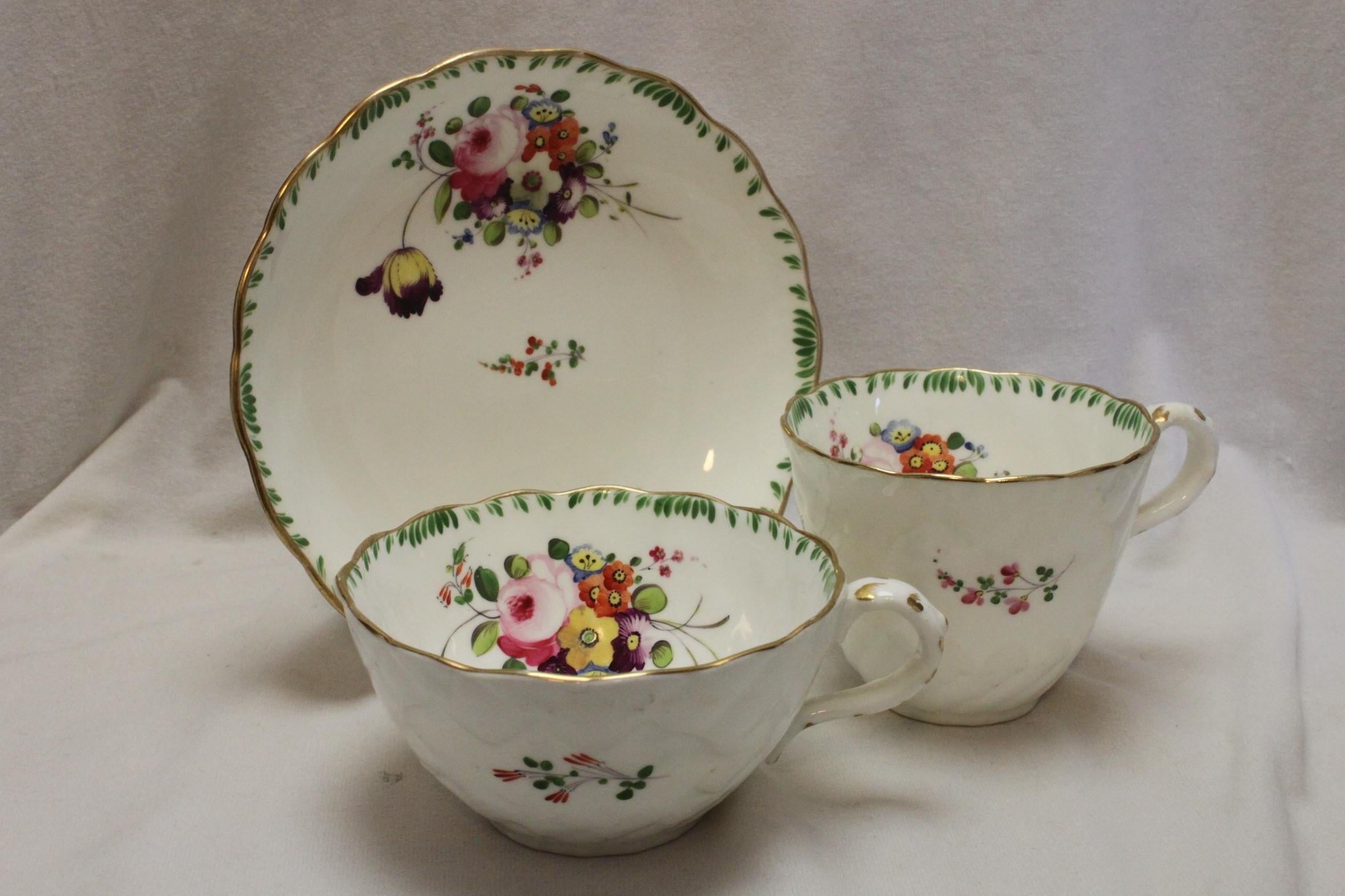 A very pretty Rockingham hand painted and gilded trio decorated with pattern 958. The shape is 