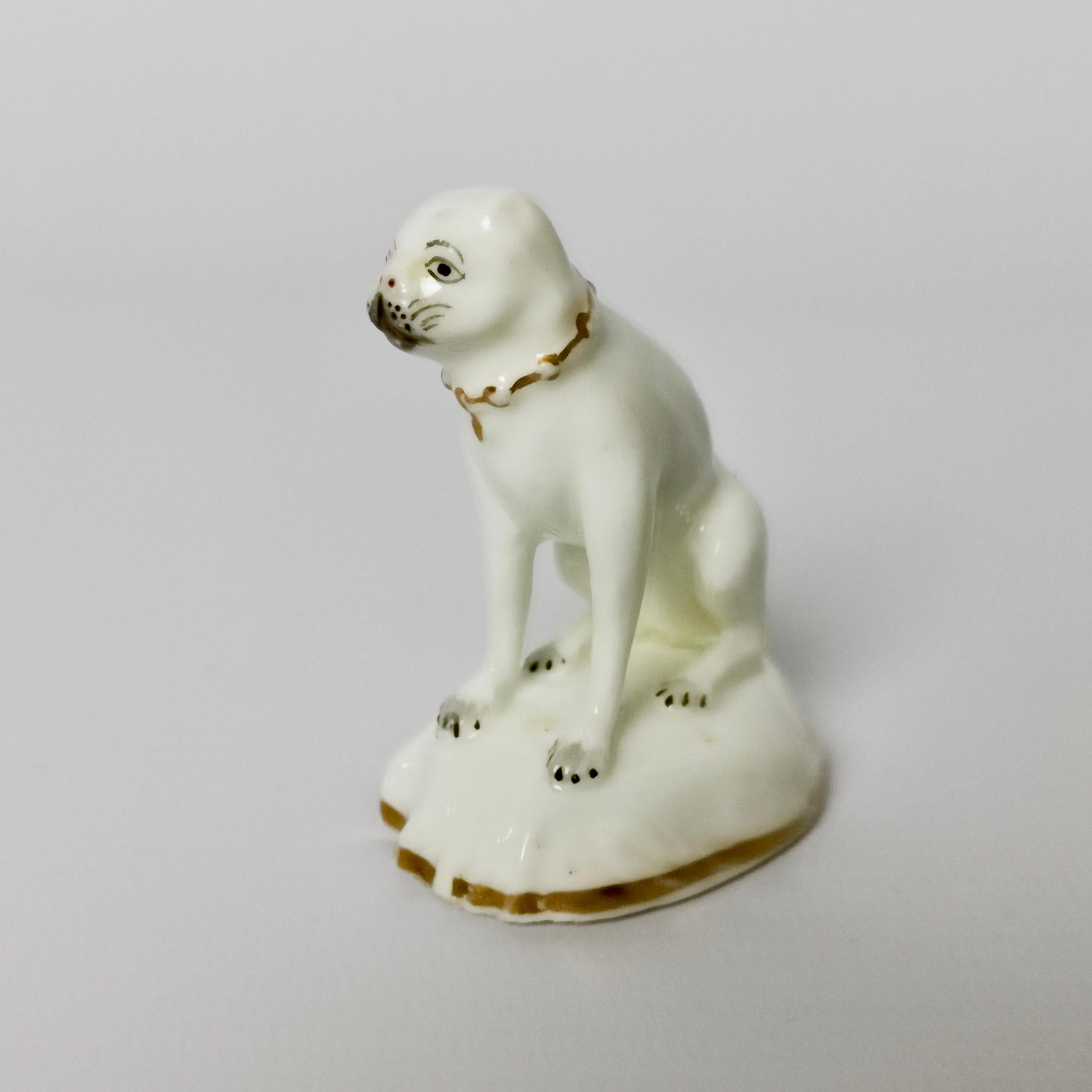 This is a very charming porcelain pug dog made by Rockingham in about 1835.

This tiny dog would make a perfect Valentine's Day gift!

Although the Rockingham pottery started some time in the mid-18th century, when we say 