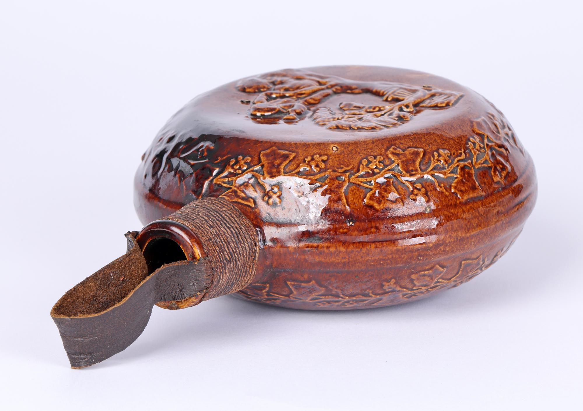 Early 19th Century Rockingham Rare Treacle Glazed Smoking Scene Pottery Flask For Sale