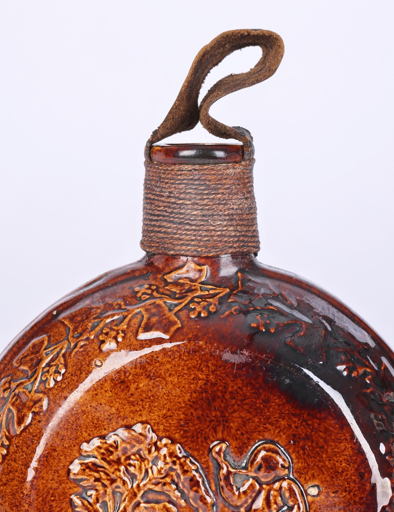 Rockingham Rare Treacle Glazed Smoking Scene Pottery Flask For Sale 1