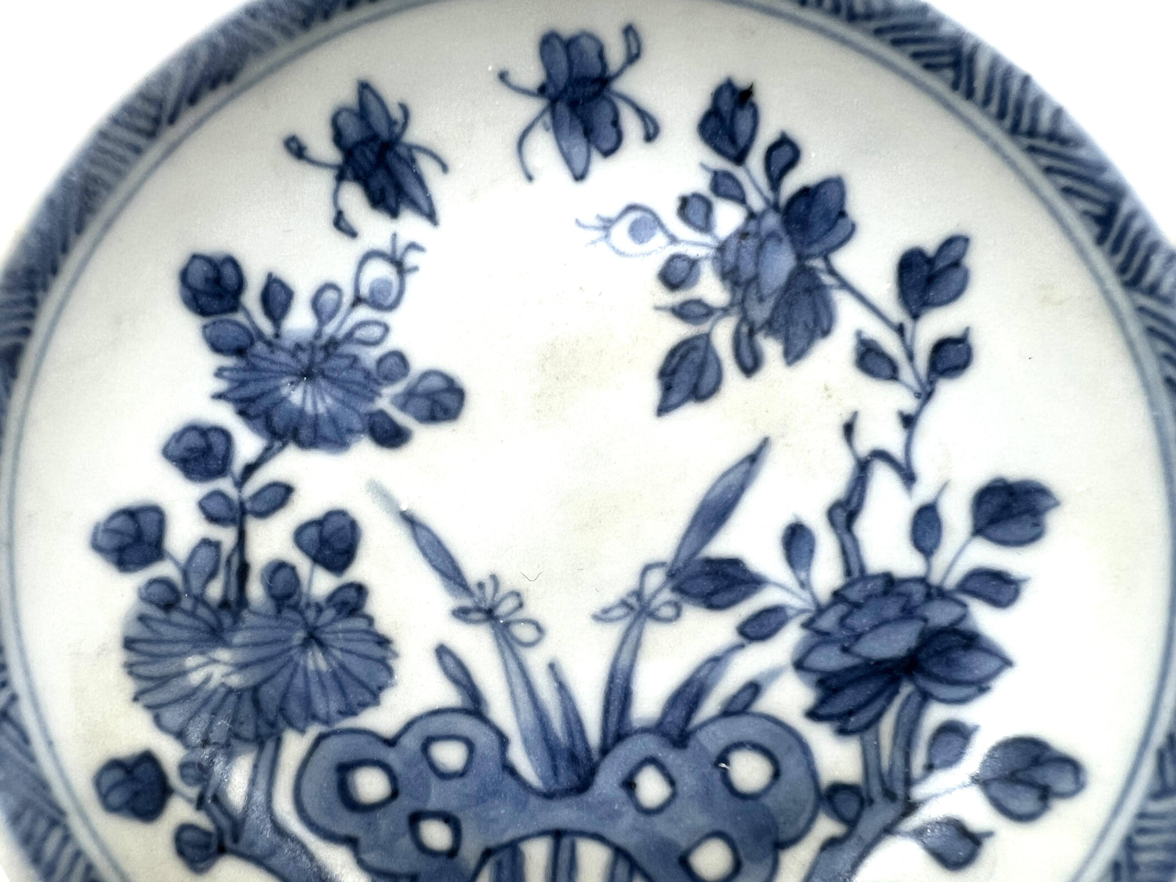 With peony and chrysanthemum plants flowering on a terrace, butterflies in flight.

Period : Qing Dynasty, Yongzheng Period
Production Date : C 1725
Made in : Jingdezhen
Destination : Netherland
Found/Acquired : Southeast Asia , South China Sea, Ca