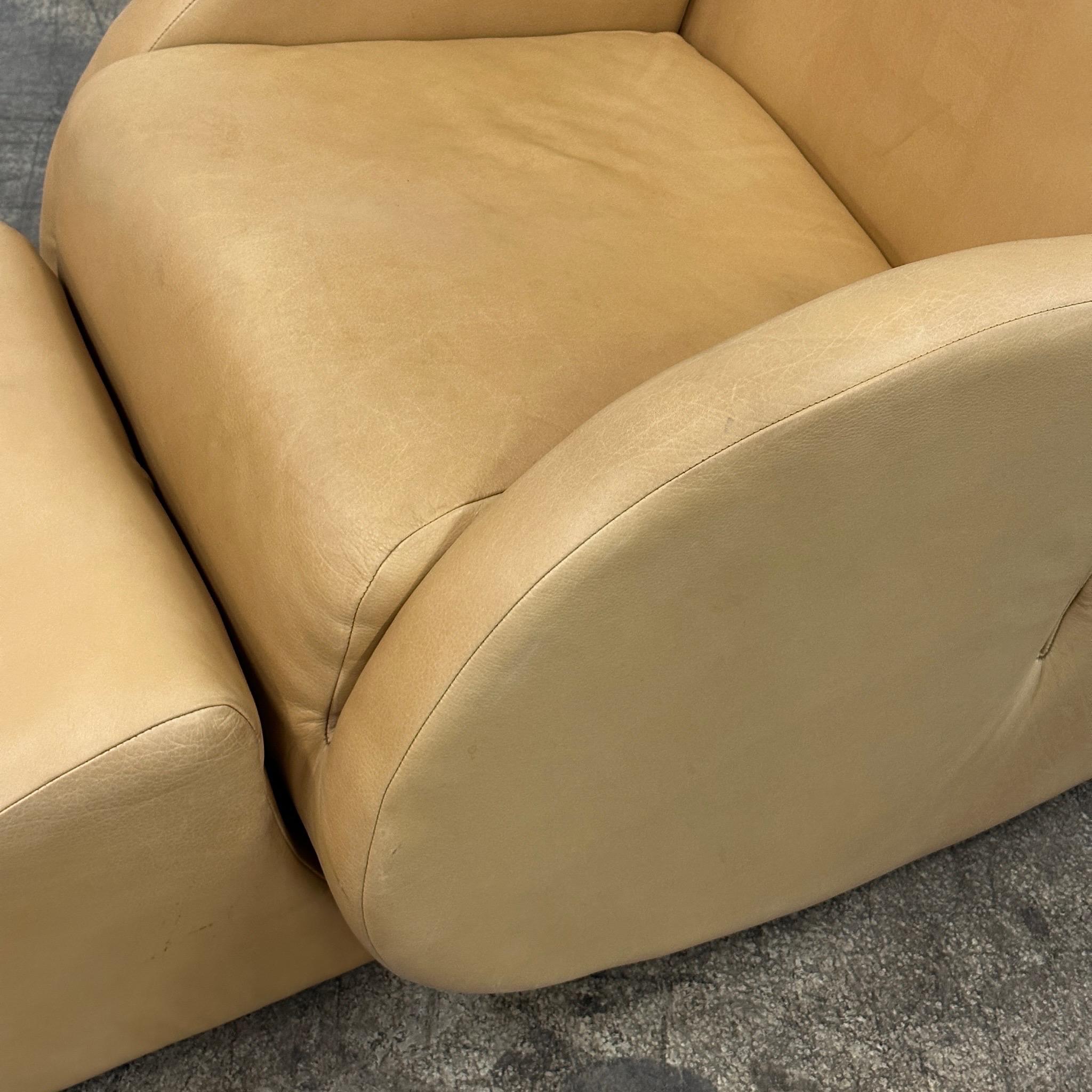 c. 1997. Original tan leather rocking chair designed by Vladimir Kagan. Tagged.

Ottoman Dimensions: 21