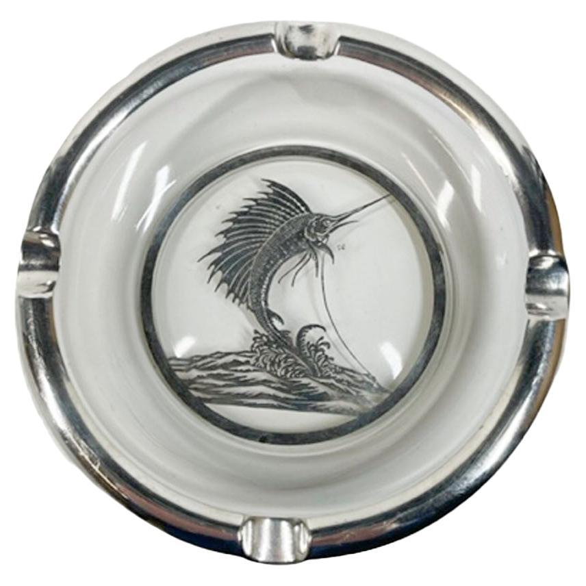 Rockwell Silver Co. Silver Overlay on Clear Glass Ashtray with Leaping Sailfish For Sale