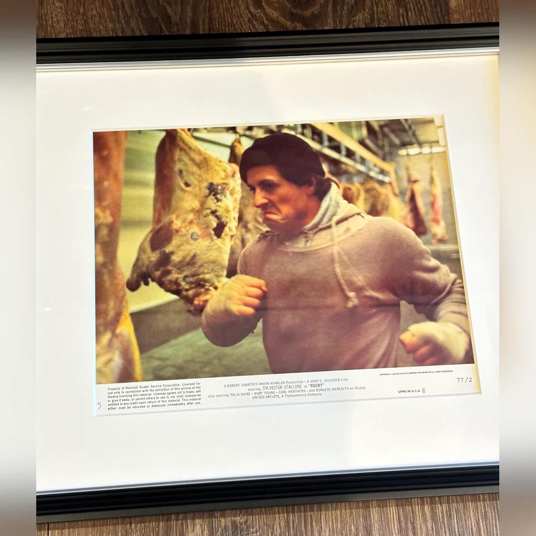 Rocky (1976) - FRAMED
Lobby Card (8 X 10 Inches)

Original US Mini Lobby Card #5.

Authentic Mini Lobby Card featuring Sylvester Stallone in the legendary meat locker training scene from Rocky. This classic image captures Rocky Balboa’s raw