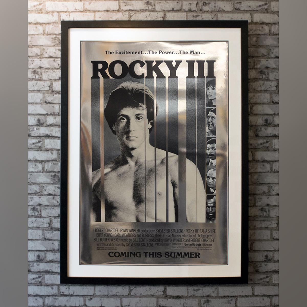 Rocky III advance foil style one sheet. Having become the world heavyweight champion, former working-class boxer Rocky Balboa (Sylvester Stallone) is rich and famous beyond his wildest dreams, which has made him lazy and overconfident. In a double